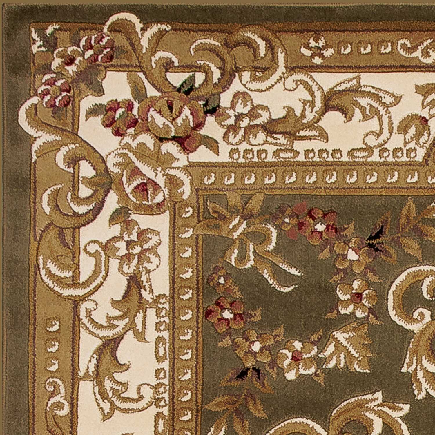 A beautiful green and ivory machine woven hand carved floral medallion rug, showcasing intricate floral patterns and a modern design.