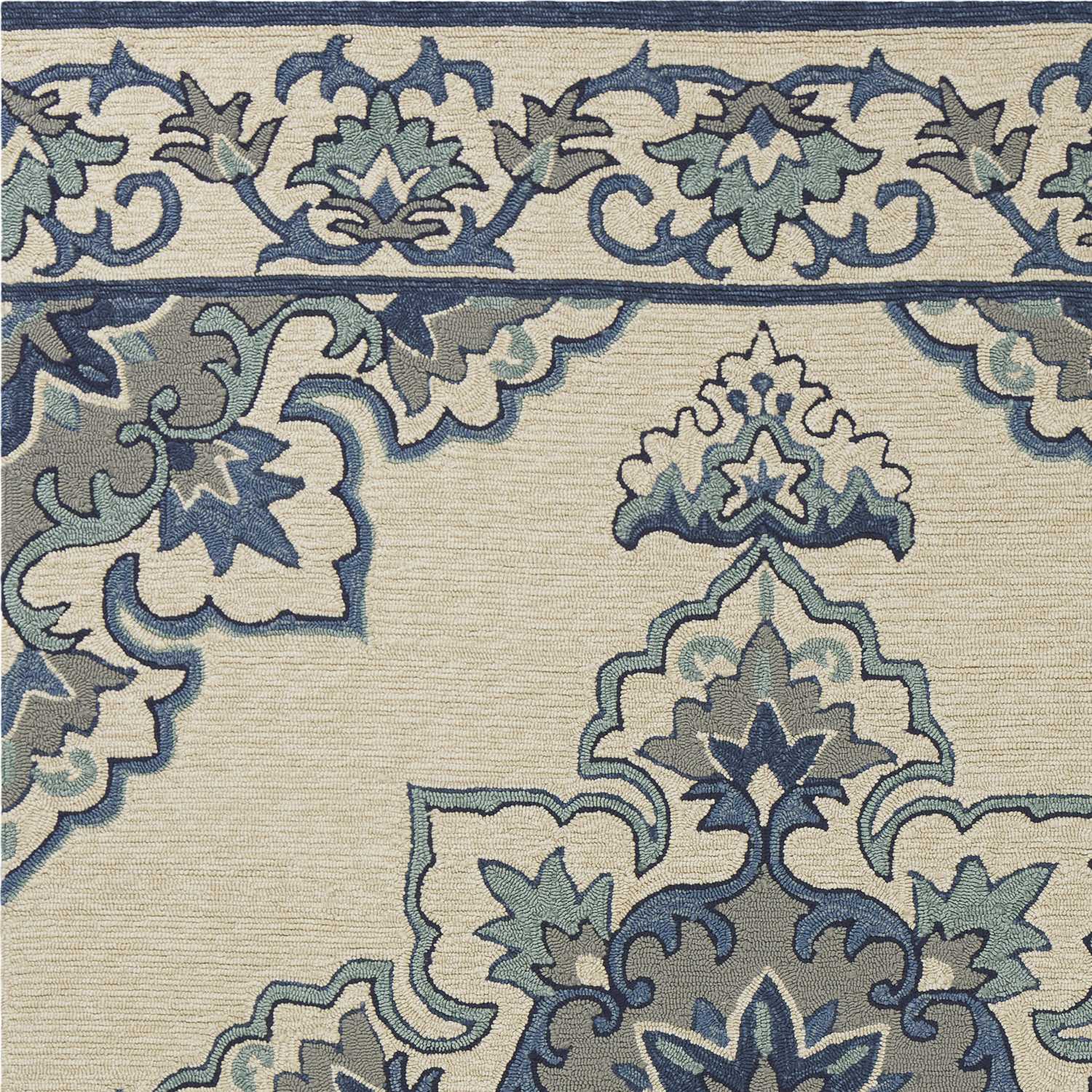 Ivory blue hand hooked floral medallion rug, perfect for indoor and outdoor use, showcasing intricate design and vibrant colors.