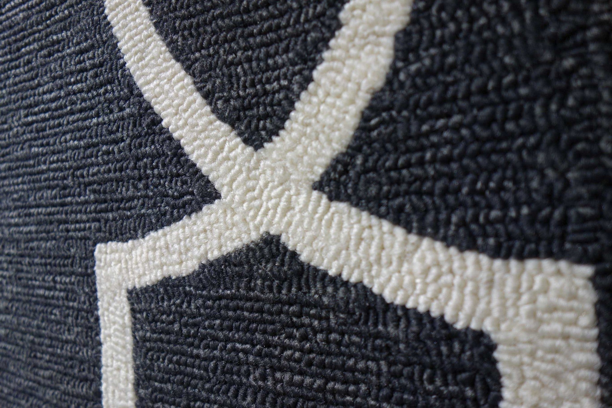 2x3 Onyx Black Hand Hooked UV Treated Rug showcasing its elegant design and durable material, suitable for indoor and outdoor use.