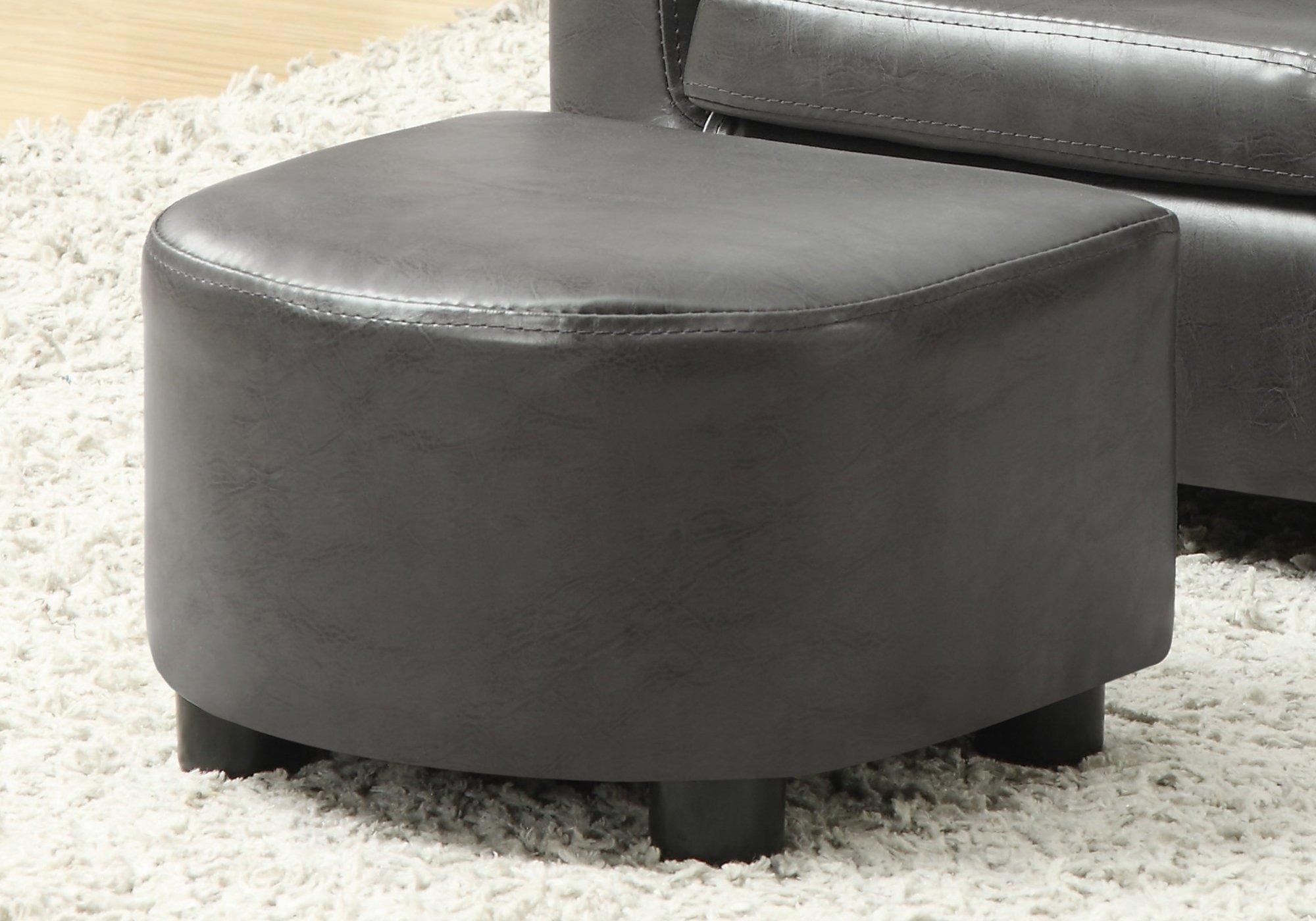 Set of two charcoal grey leather look juvenile chairs, stylish and comfortable for children's rooms.