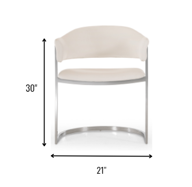 30-inch white leatherette dining chair with stainless steel legs, showcasing a modern and elegant design suitable for dining rooms.