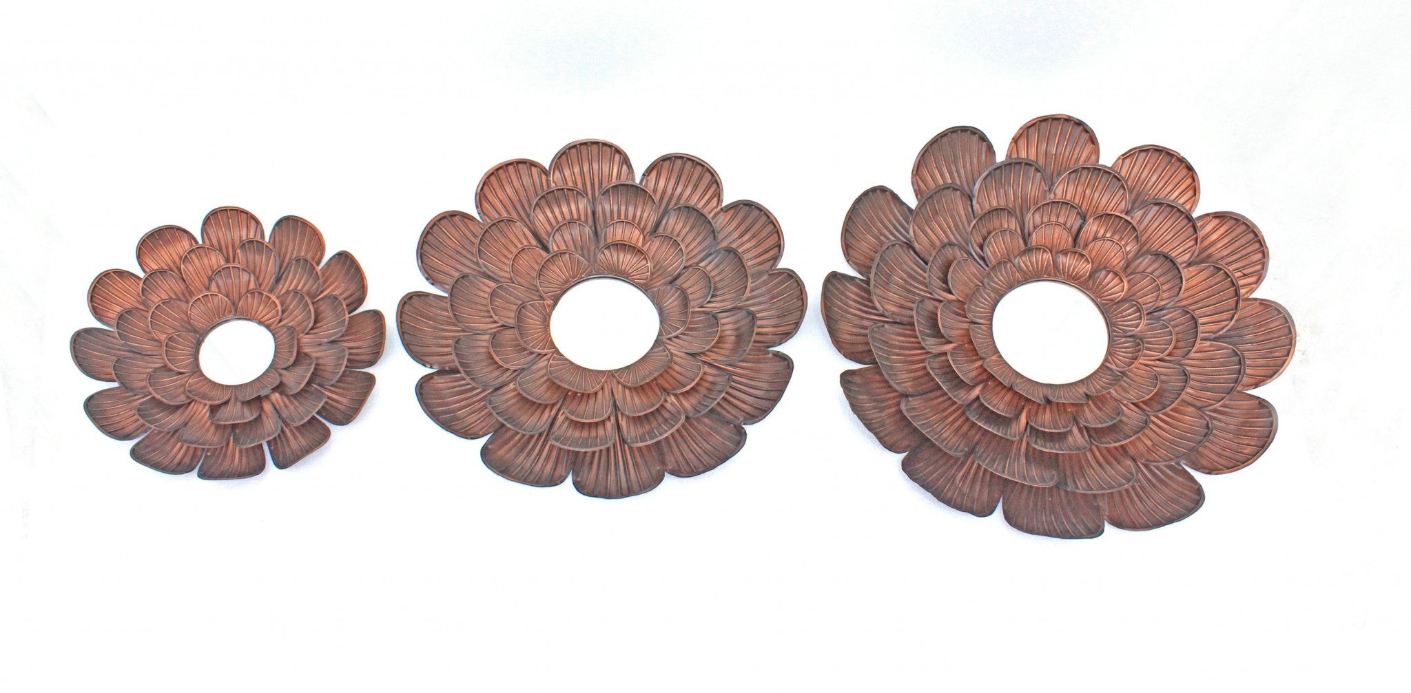 A stunning 31 x 31 x 3.5 Copper Vintage Blooming Flower Metal Wall Mirror featuring a unique flower shape and antiqued copper finish, perfect for home decor.
