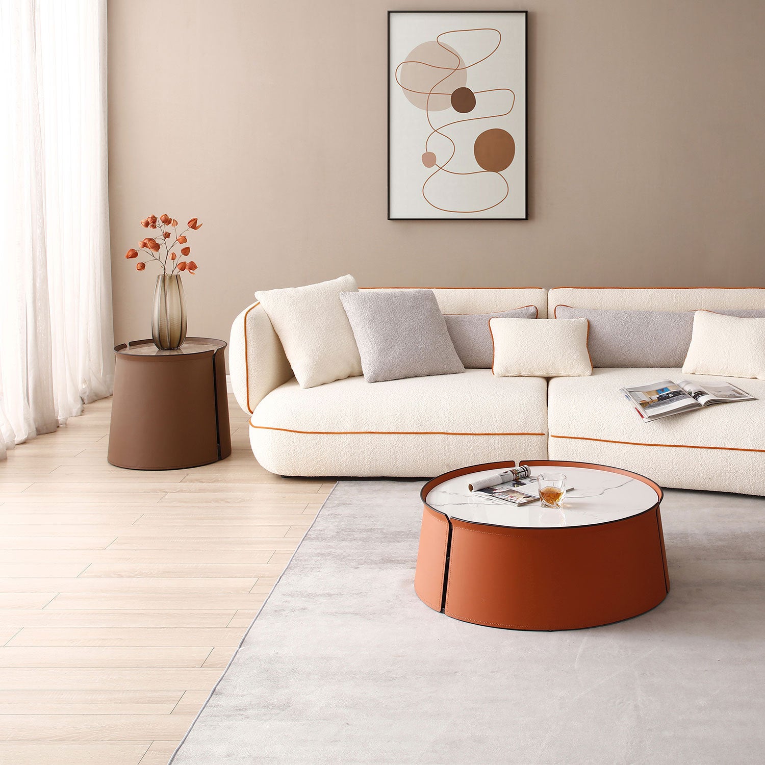 A stylish 31.5-inch coffee table featuring a luxurious marble top, vibrant orange saddle leather body, and a sturdy iron frame, perfect for modern living spaces.