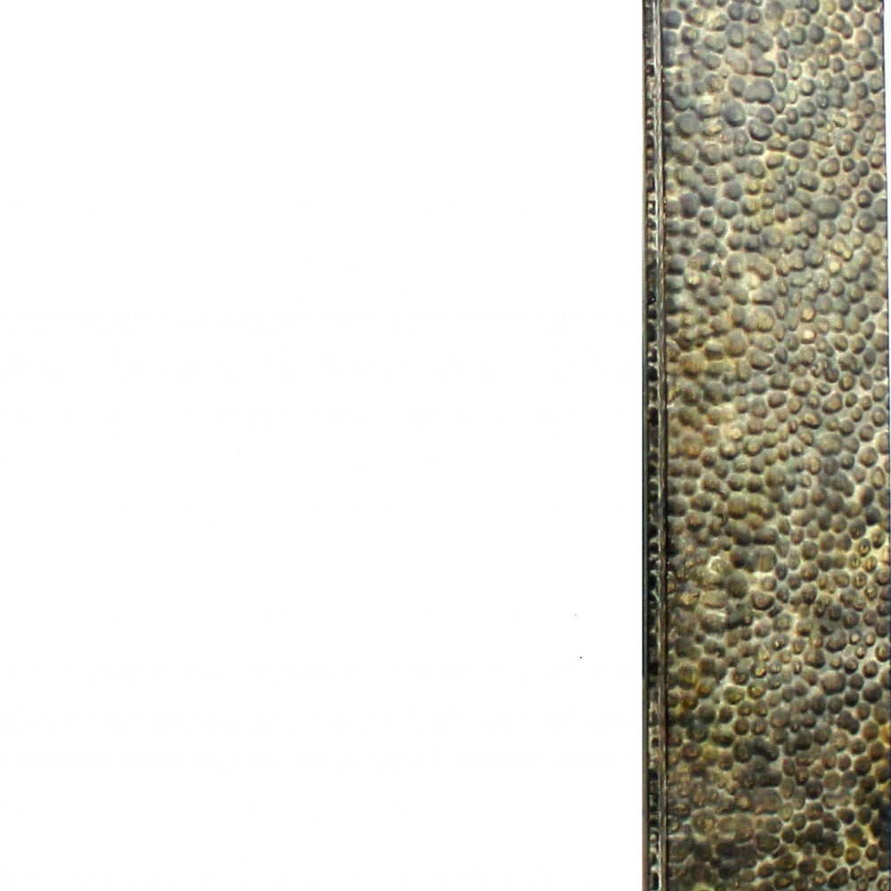 A rectangular dressing mirror with a bronze gravel-like mosaic frame, showcasing a coastal style perfect for home decor.