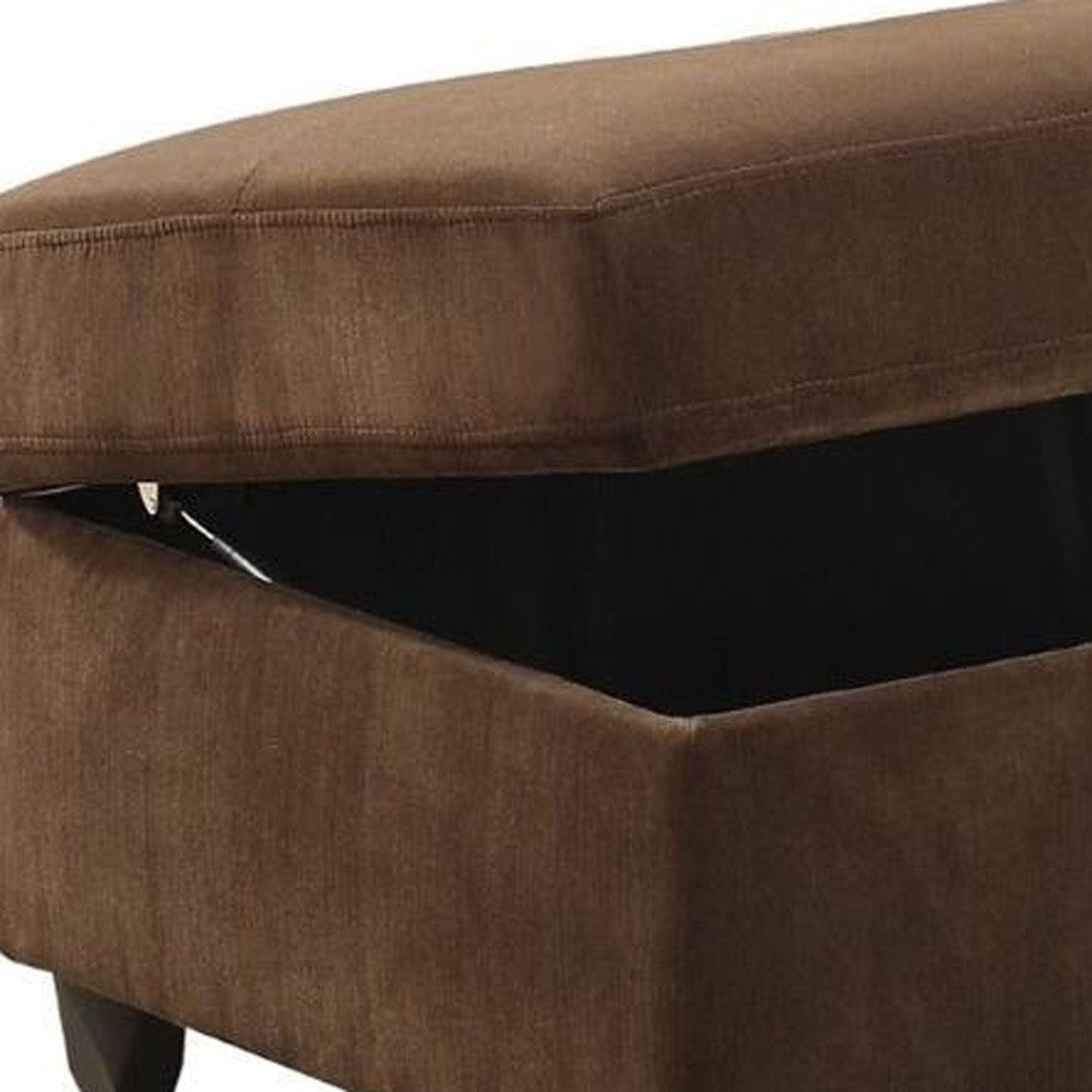 Chocolate velvet ottoman with storage, featuring buttonless tufted seat cushion and elegant design, perfect for living room use.