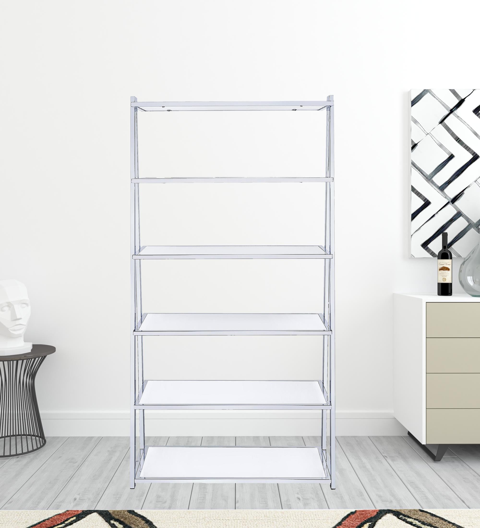 A modern white high gloss and chrome bookcase featuring six fixed wooden shelves, elegantly displayed in a living room setting.
