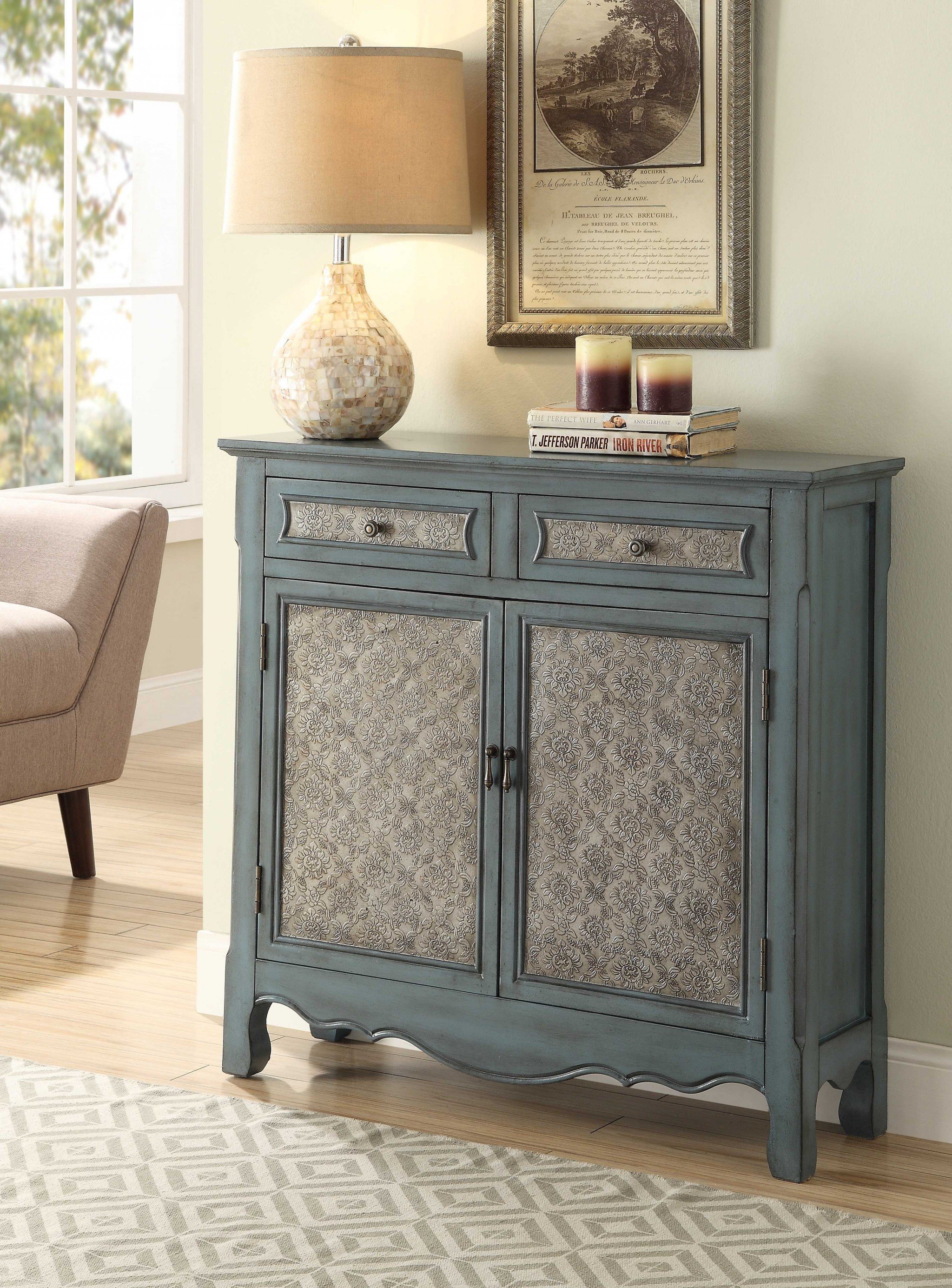 Antique blue wooden console table with two drawers and doors, showcasing vintage design and sturdy wooden legs.