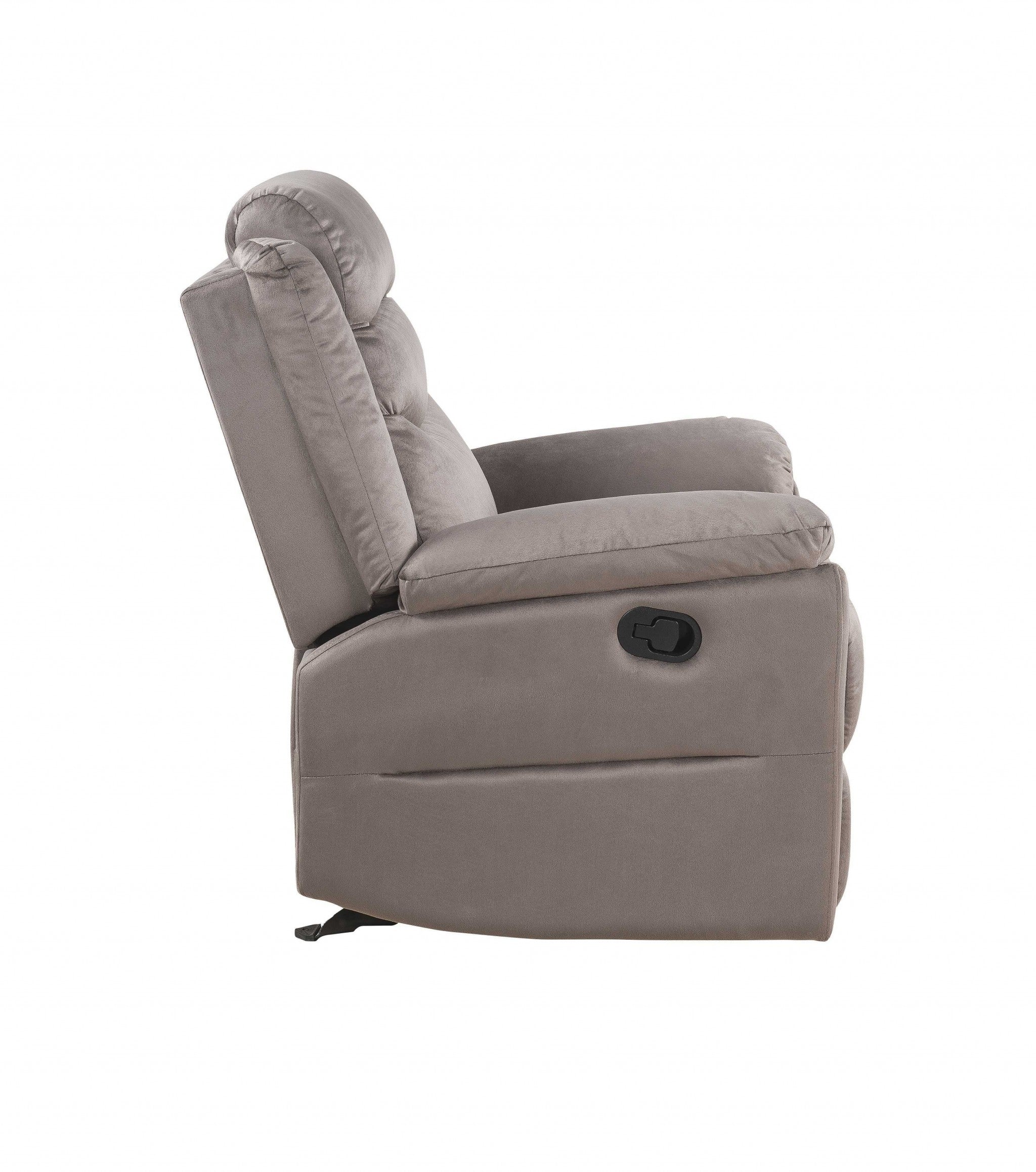 A luxurious 37x35x42 inches velvet upholstery metal reclining chair with nail head trim and pillow top armrests, perfect for living room relaxation.