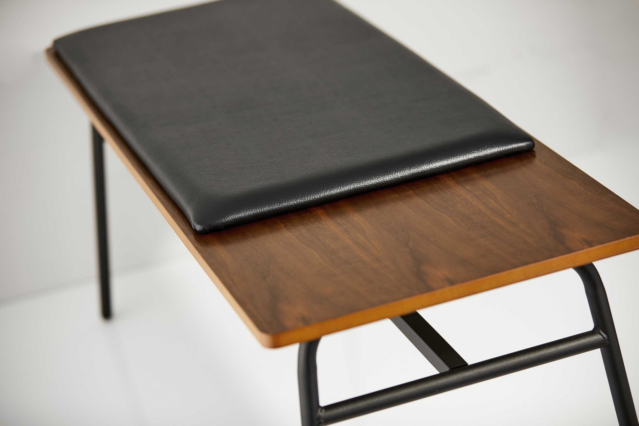 39 inches X 15.75 inches X 16.5 inches walnut bench with soft foam seat and black metal frame, perfect for entryways and bedrooms.