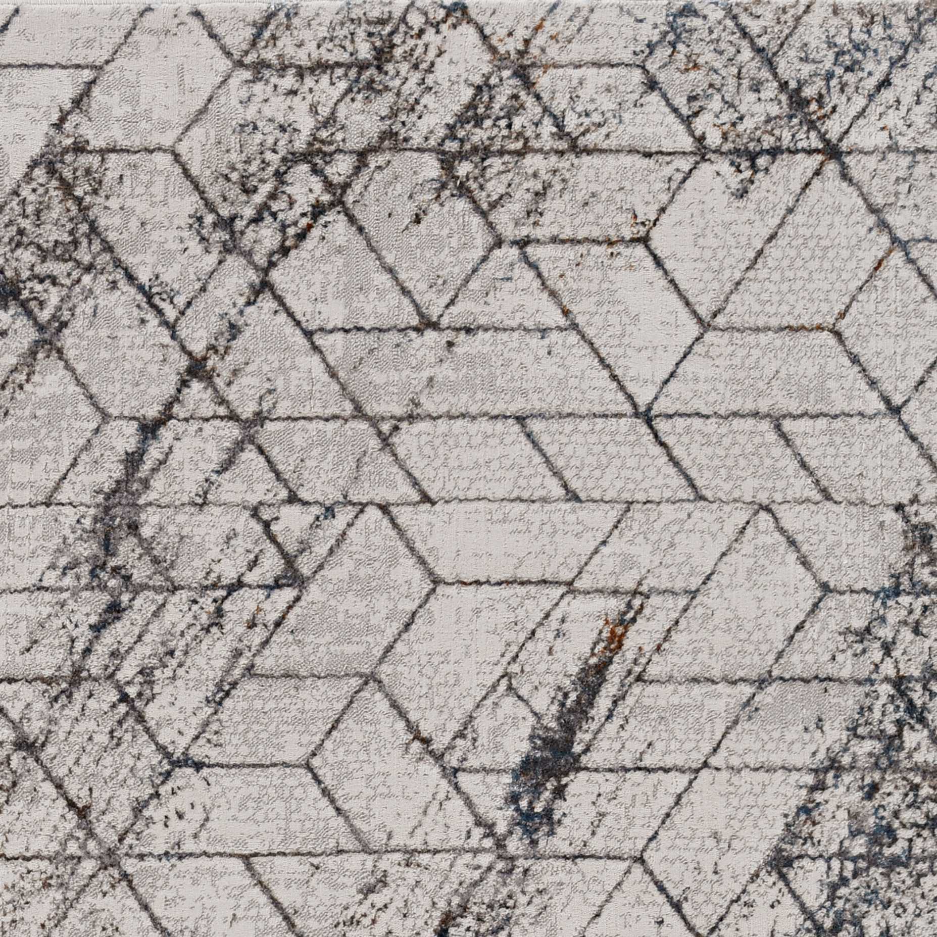 3 inches x 5 inches ivory geometric pattern area rug with metallic highlights, showcasing a stylish design suitable for various home decor styles.