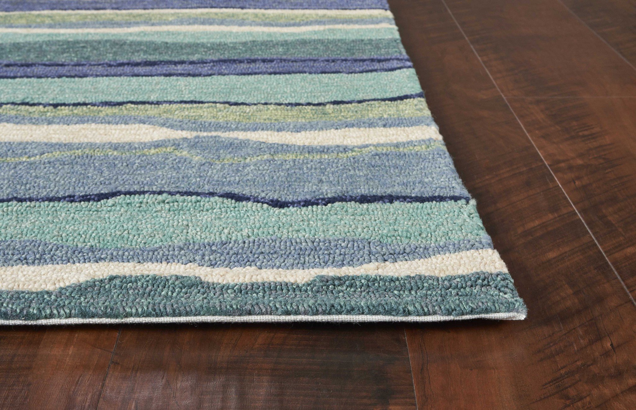 3x5 Blue Teal Hand Hooked Abstract Waves Indoor rug showcasing elegant ocean wave patterns and vibrant colors.