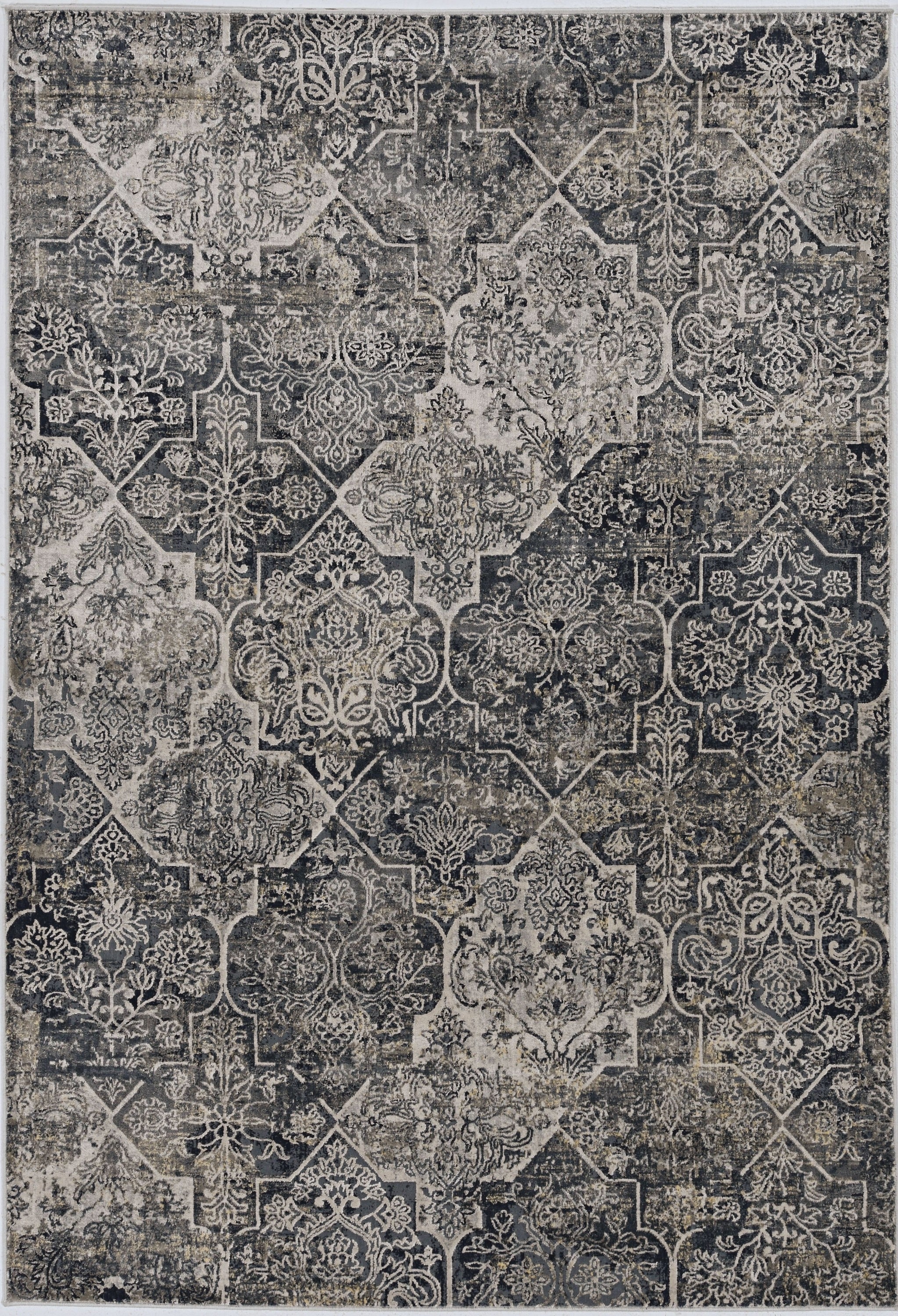 3x5 grey machine woven quatrefoil indoor area rug with elegant patterns and metallic accents, perfect for enhancing living spaces.