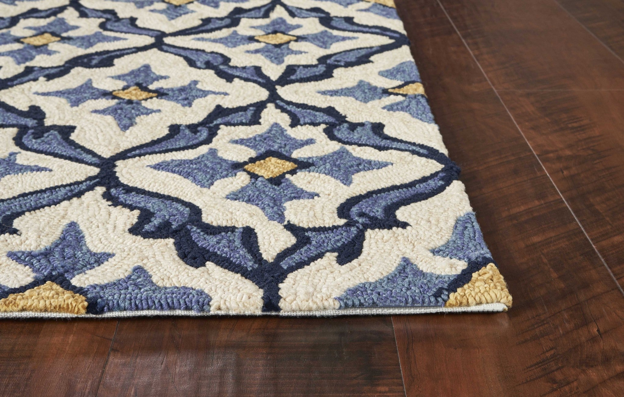 3x5 inches ivory blue hand hooked quatrefoil rug, showcasing intricate patterns and UV treated polypropylene material, suitable for indoor and outdoor use.