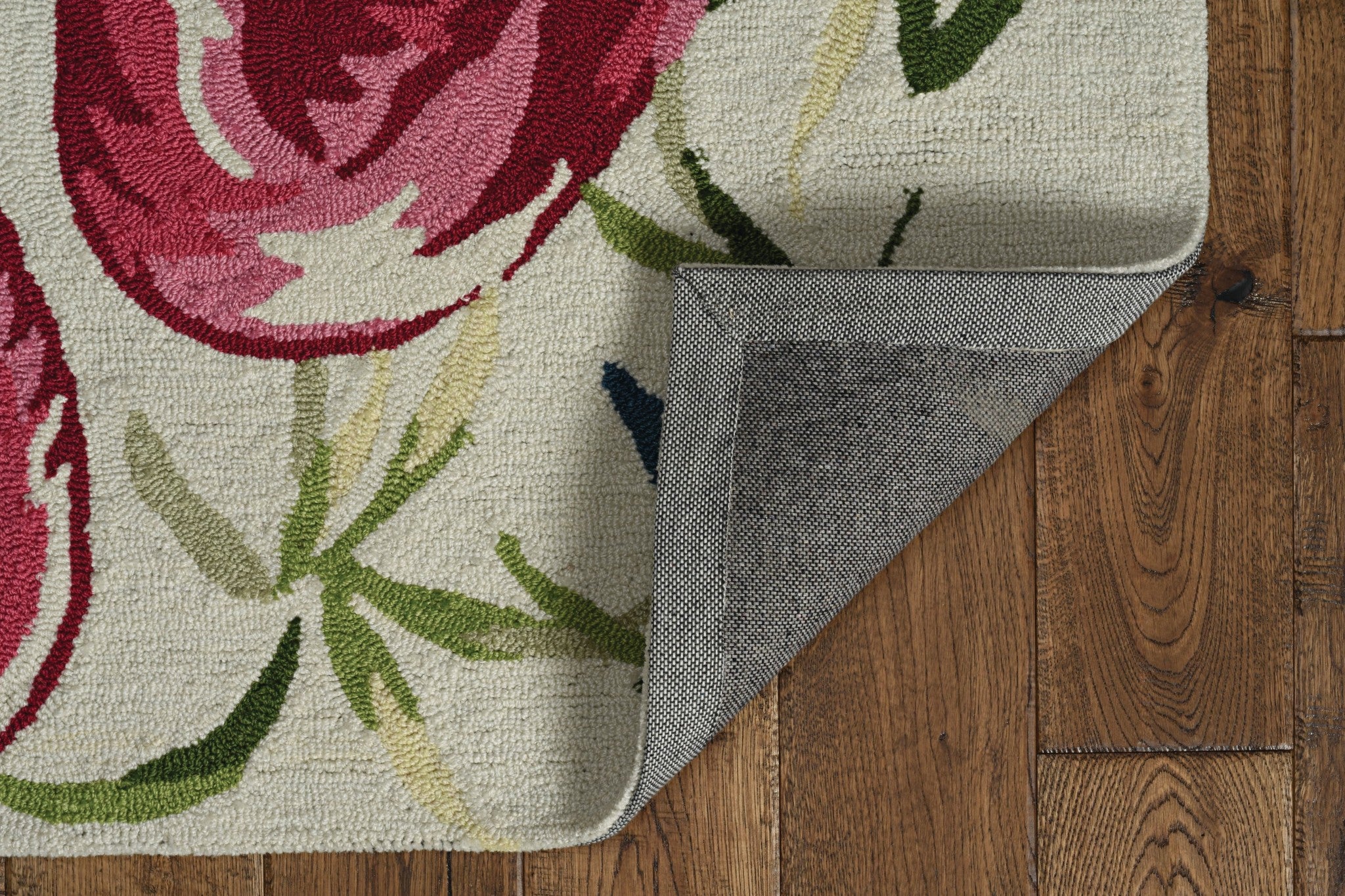 Ivory pink hand hooked flamingo indoor area rug featuring a vibrant flamingo design, perfect for adding style to any room.