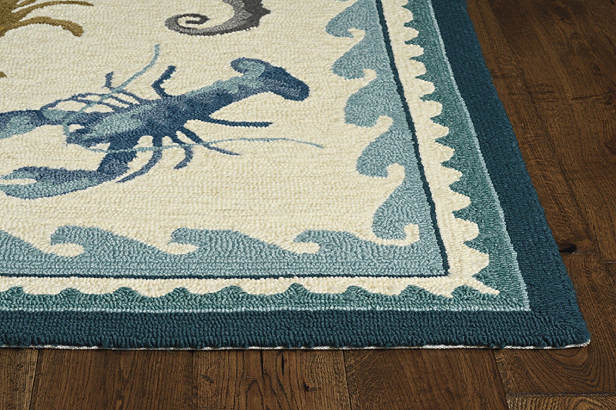 3x5 inches ivory teal hand-hooked rug featuring coastal sea life design, suitable for indoor and outdoor use.