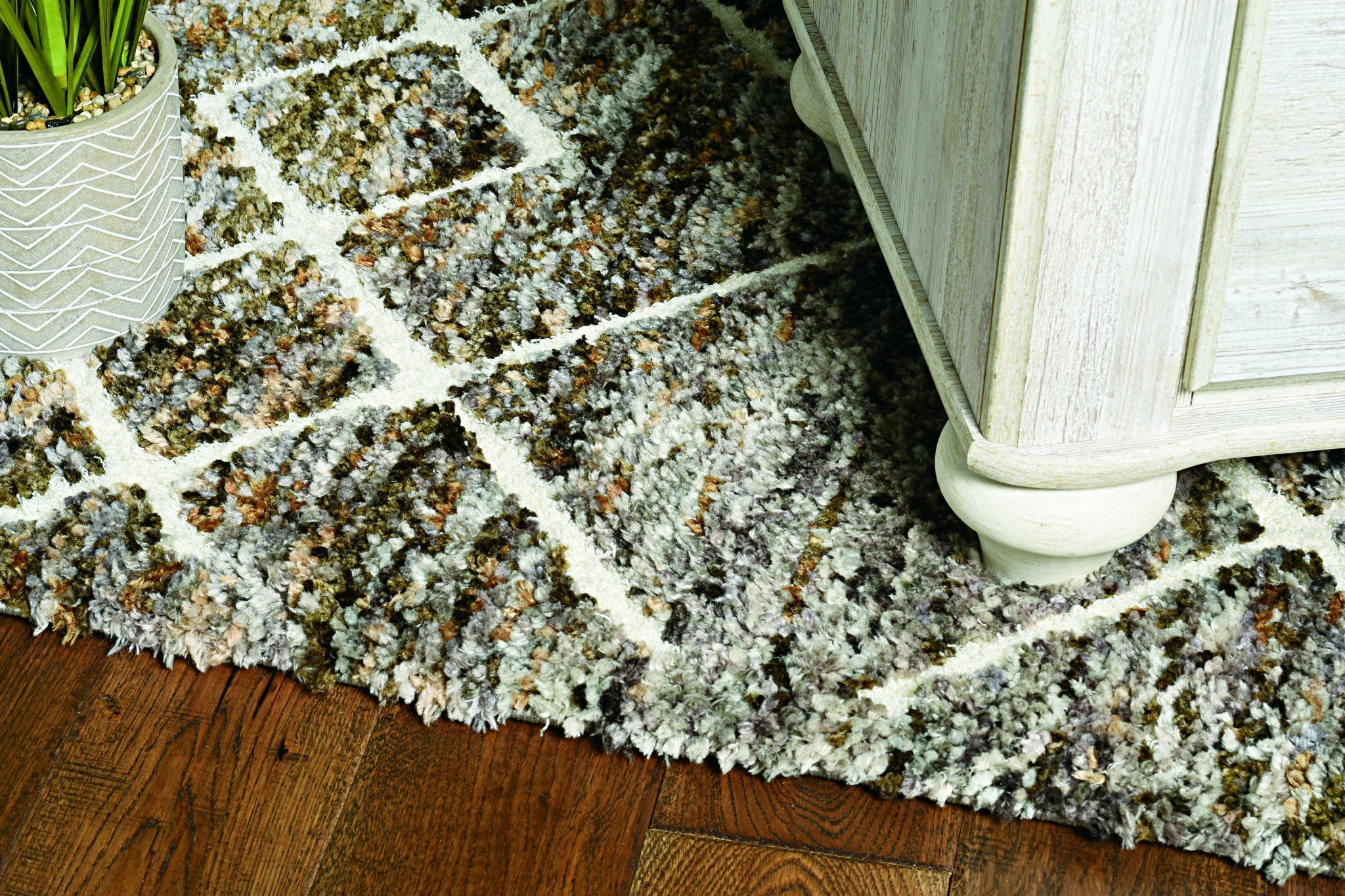 3x5 Mocha Brown Machine Woven Rug featuring a geometric diamond pattern and fringe detailing, perfect for contemporary living spaces.