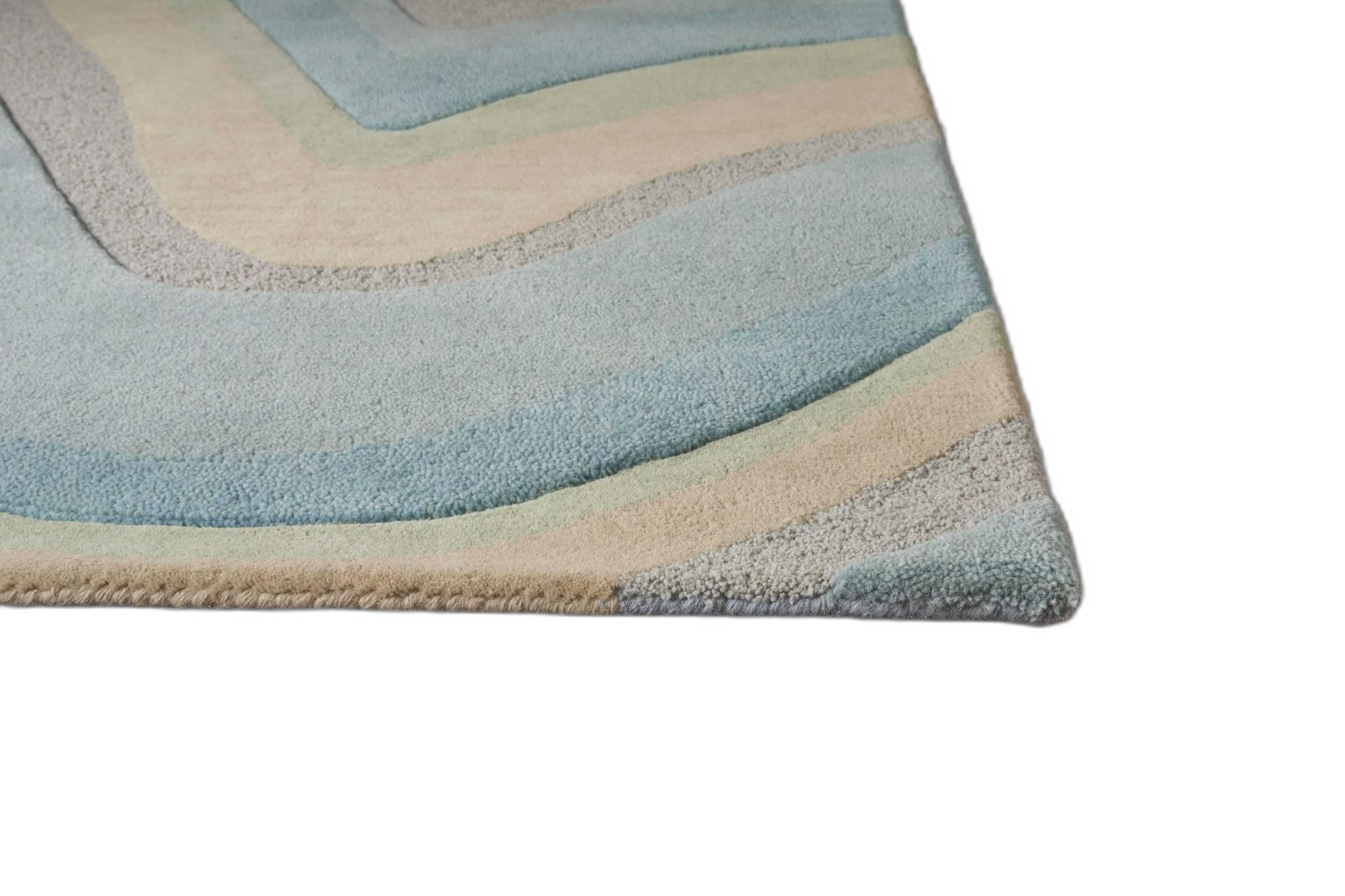 Ocean Blue Beige Hand Tufted Abstract Waves Indoor Rug, showcasing abstract wave patterns in soothing colors, perfect for modern interiors.