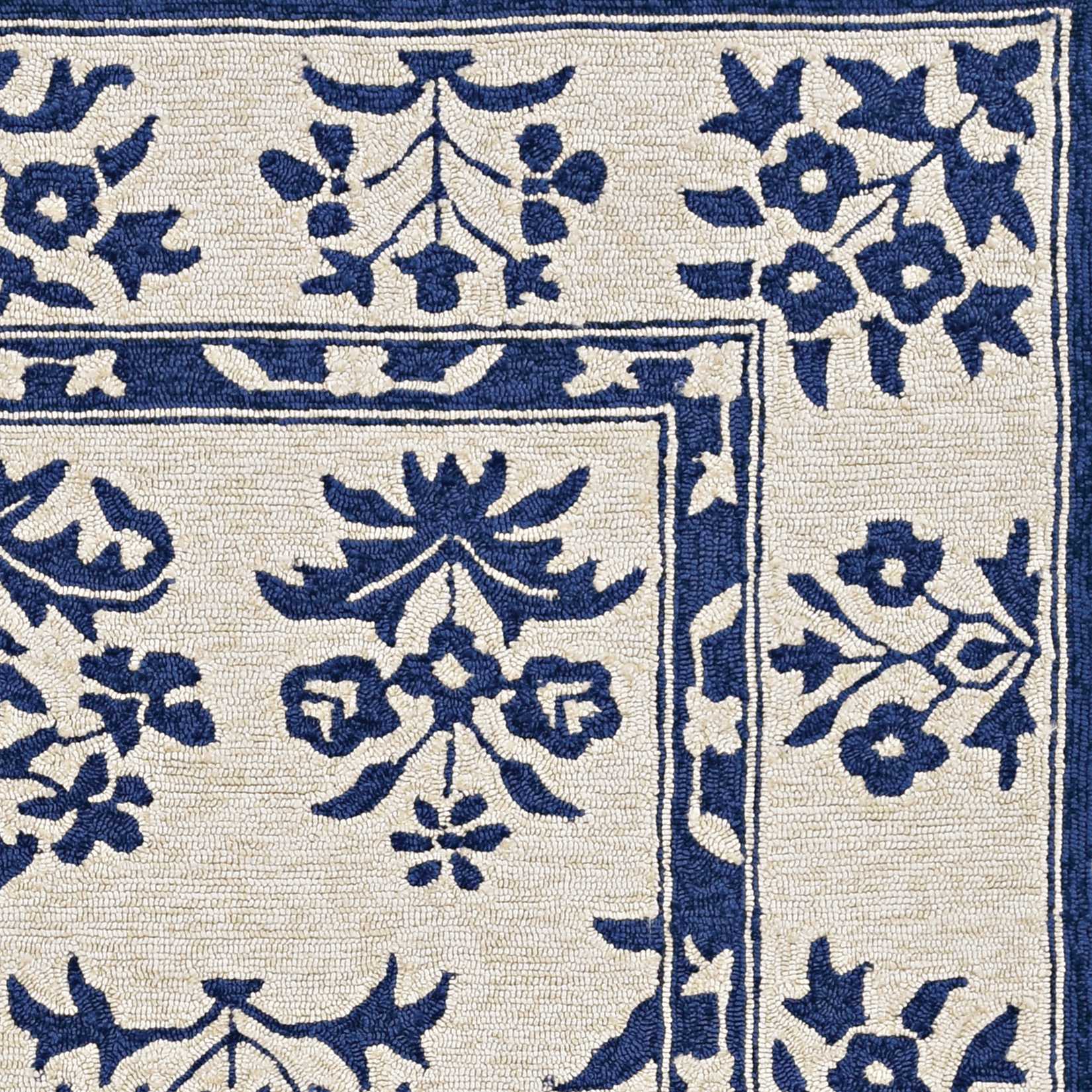 3x5 sand blue hand-hooked rug with traditional floral design, suitable for indoor and outdoor use.