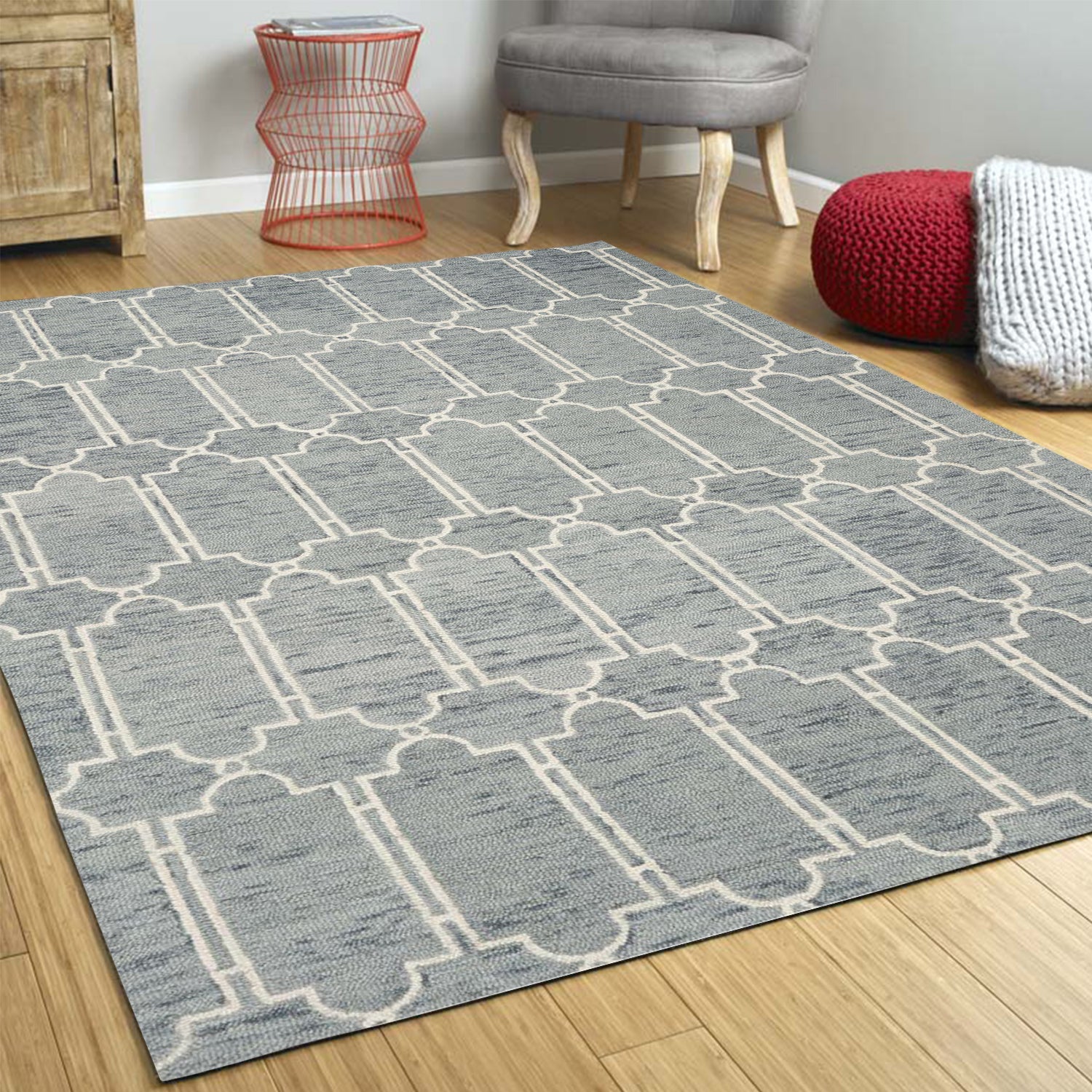 A beautiful slate blue hand-tufted geometric indoor area rug, showcasing modern patterns and a soft wool texture, perfect for enhancing home decor.