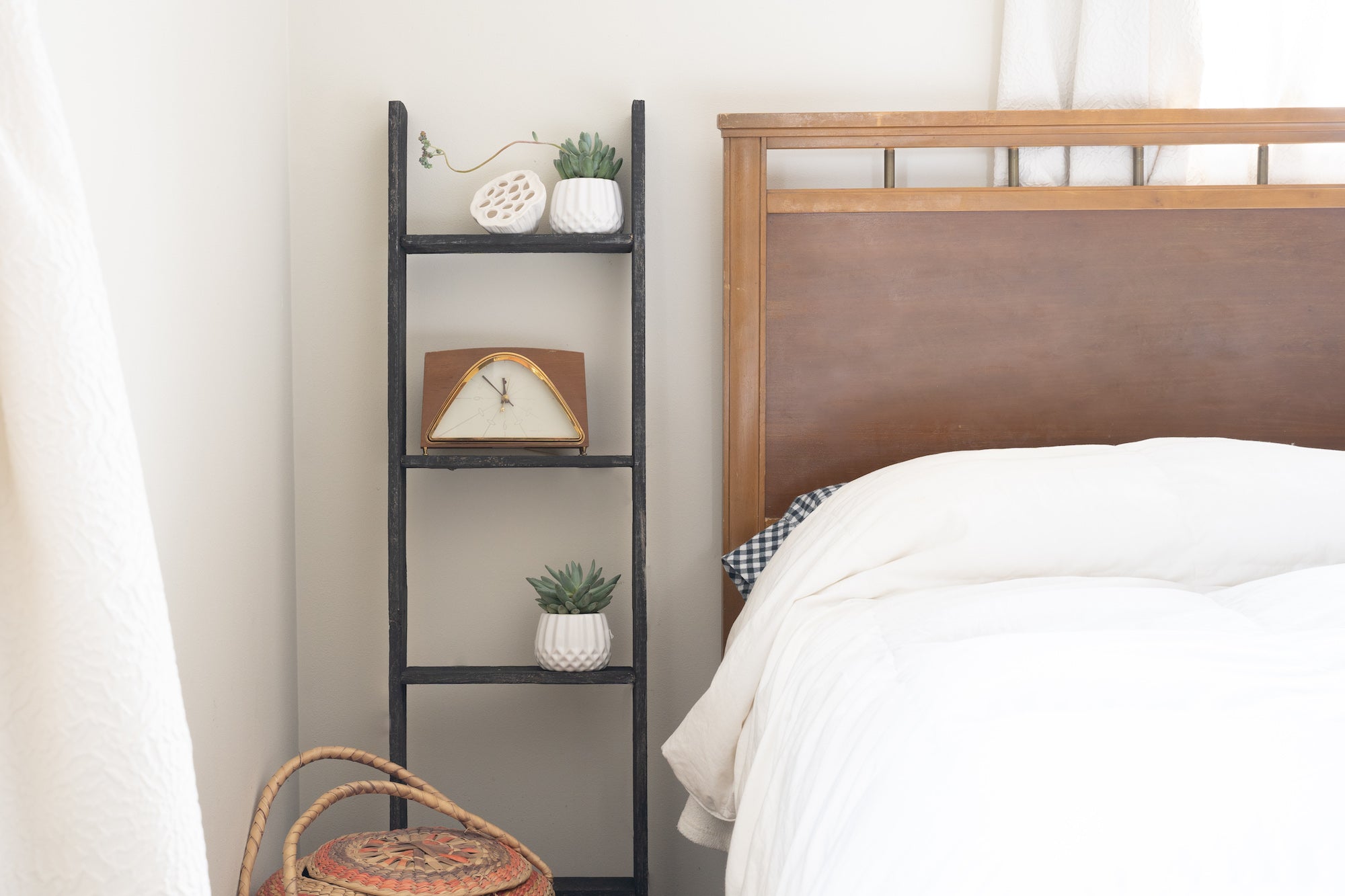 4 Step Blackwash Rustic Wood Ladder Shelf showcasing reclaimed wood craftsmanship with a stylish black finish, perfect for home decor.