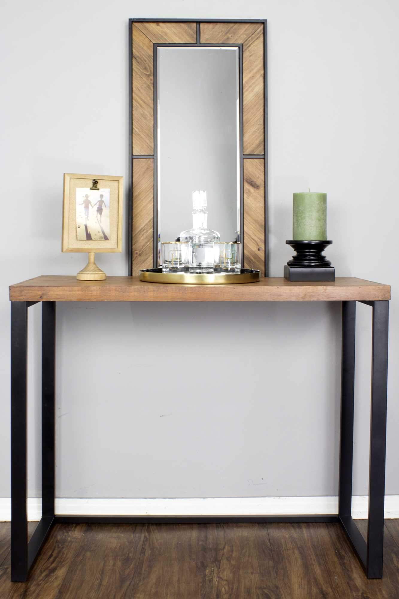 Stylish 41.25" X 16" X 30" console table made of natural metal, wood, and MDF, featuring a sophisticated design and ample storage space.