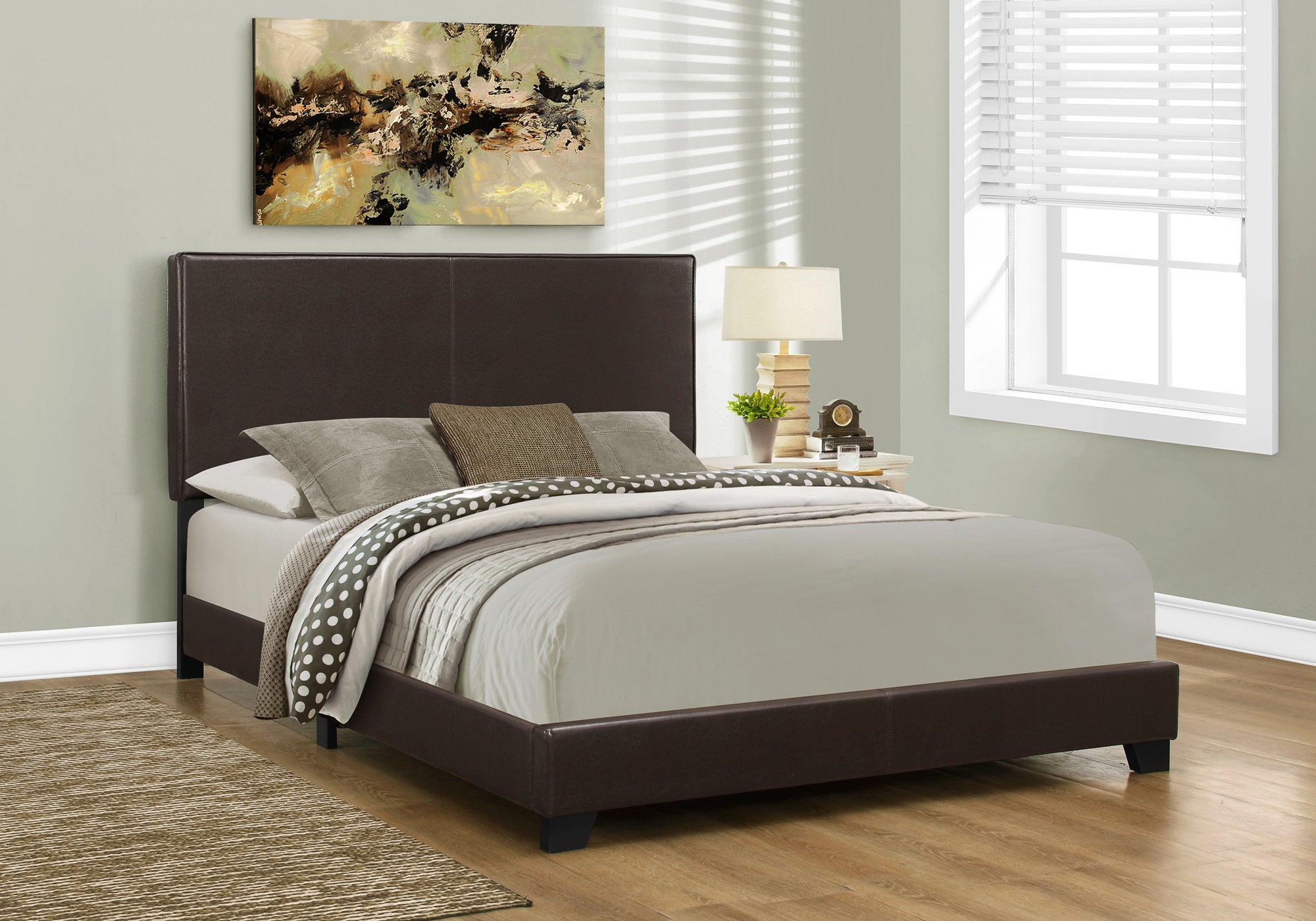 A stylish queen size bed featuring a solid wood frame, MDF construction, and a luxurious leather look, perfect for contemporary bedrooms.
