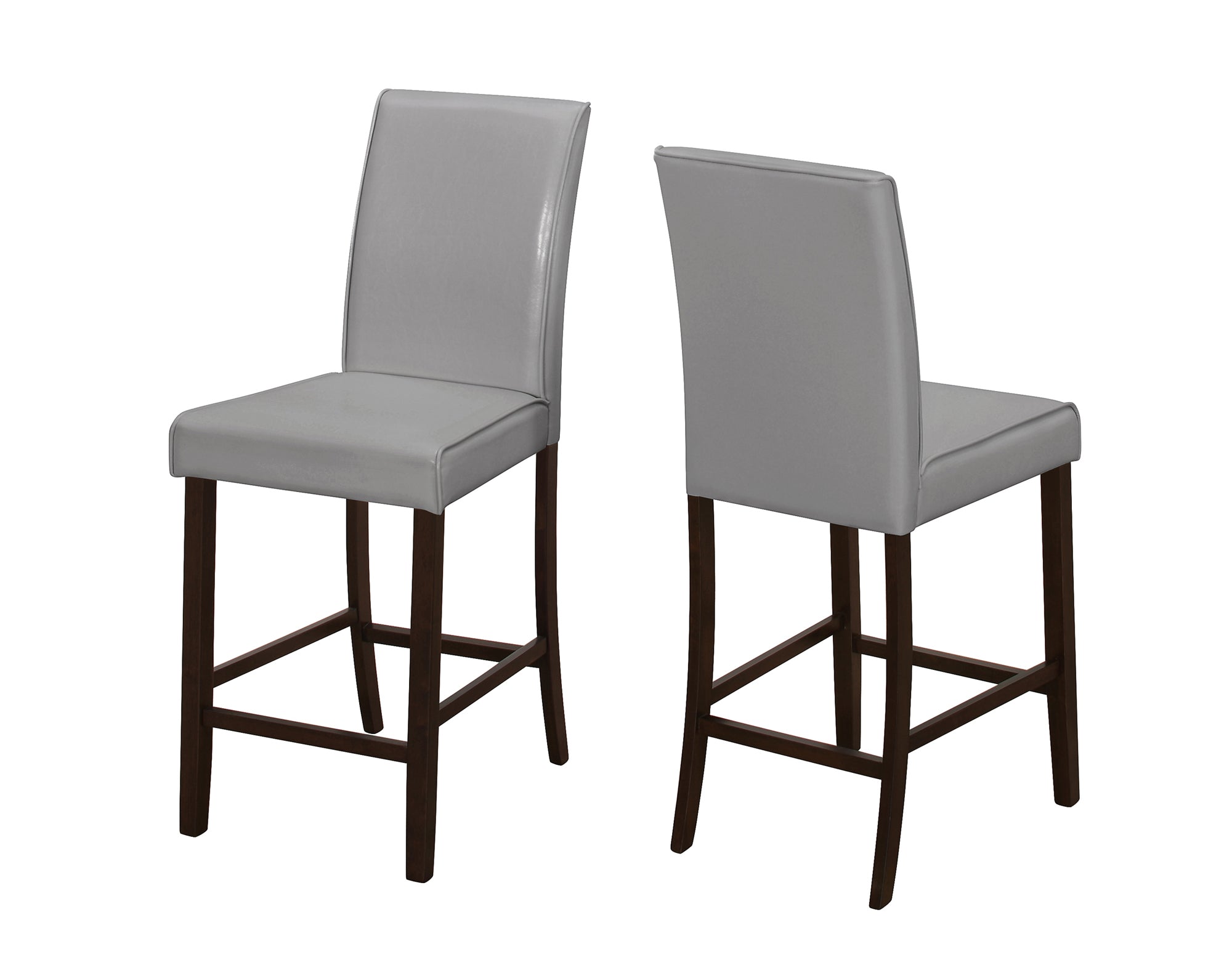 Set of two brown leather look counter height dining chairs, showcasing elegant design and sturdy construction, perfect for dining rooms.