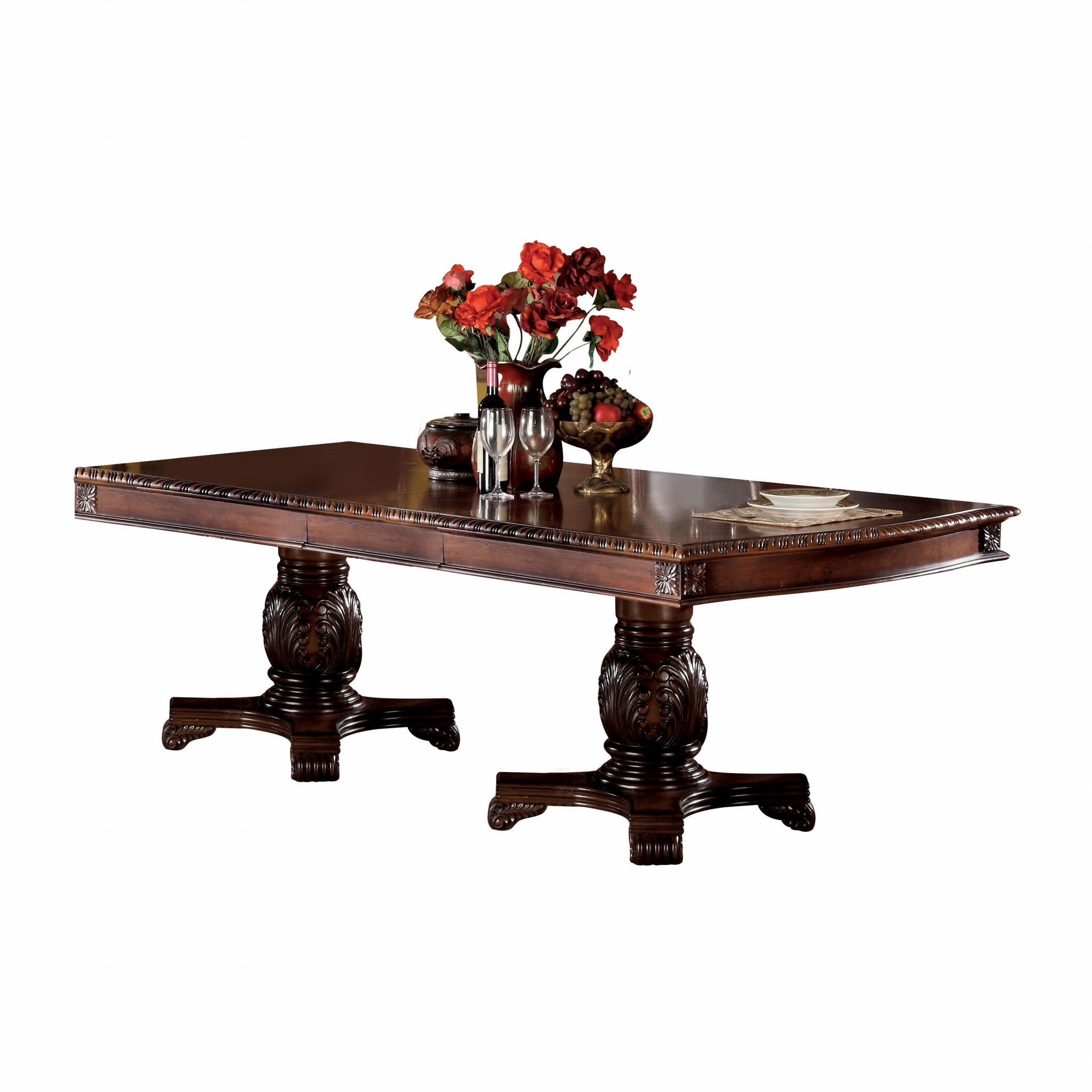 A beautifully crafted 46x96 inches cherry wood poly resin dining table with decorative carvings and a double pedestal base, perfect for elegant dining rooms.