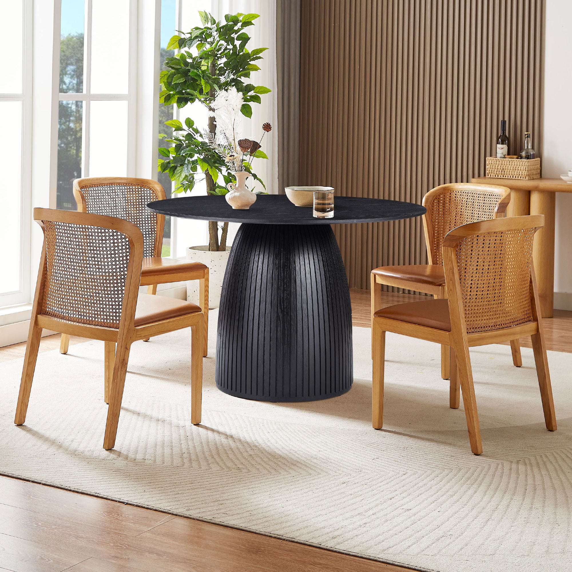 A sleek 47.24 inch MDF dining table in matte black, perfect for small spaces, showcasing a modern design suitable for dining and multi-purpose use.