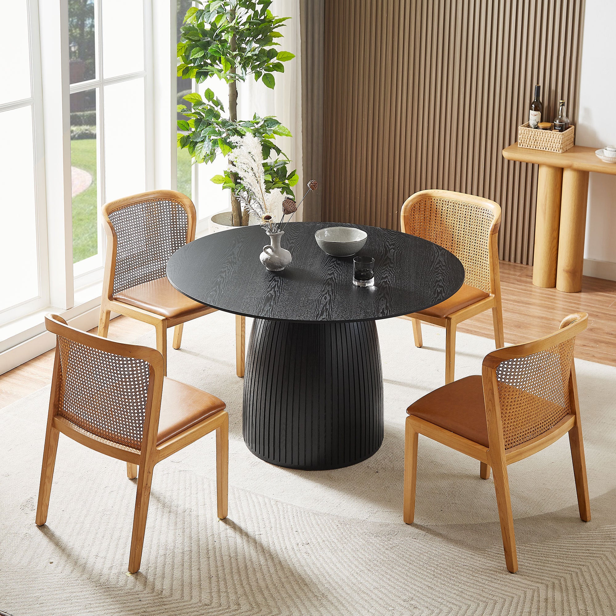 A sleek 47.24 inch MDF dining table in matte black, perfect for small spaces, showcasing a modern design suitable for dining and multi-purpose use.