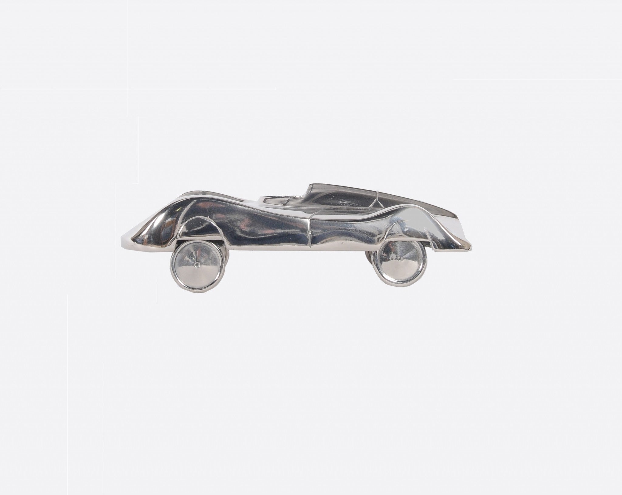 A beautifully crafted 4.75x12x3 inches aluminum car model with a nickel-plated finish, showcasing intricate details and a polished surface.