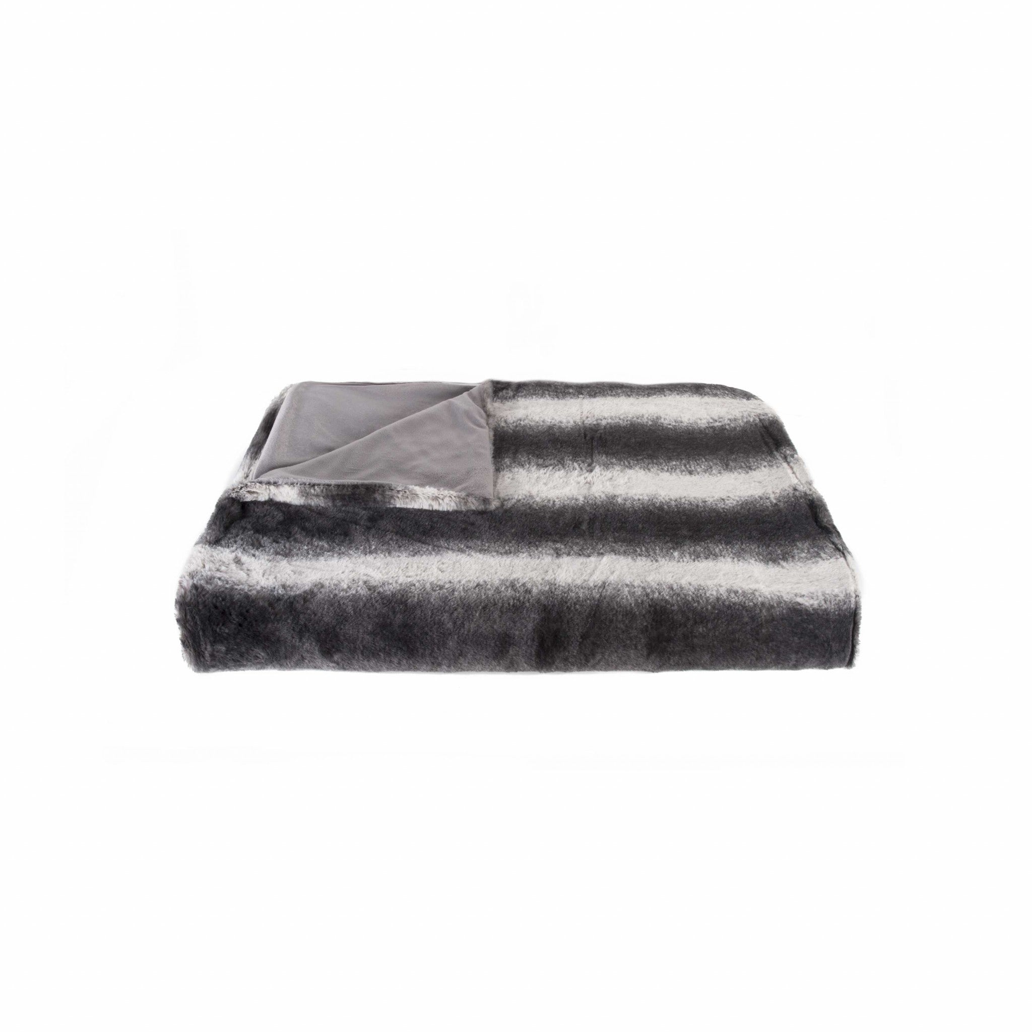50 inches x 60 inches Irving Charcoal White Fur Throw, showcasing a plush and stylish design in modern charcoal and white colors.