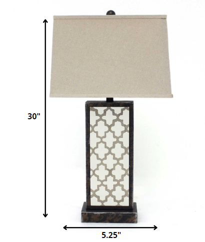 5.25 x 8 x 30 Bronze Rock Floral Base Table Lamp with beige linen shade and unique rock floral base design.