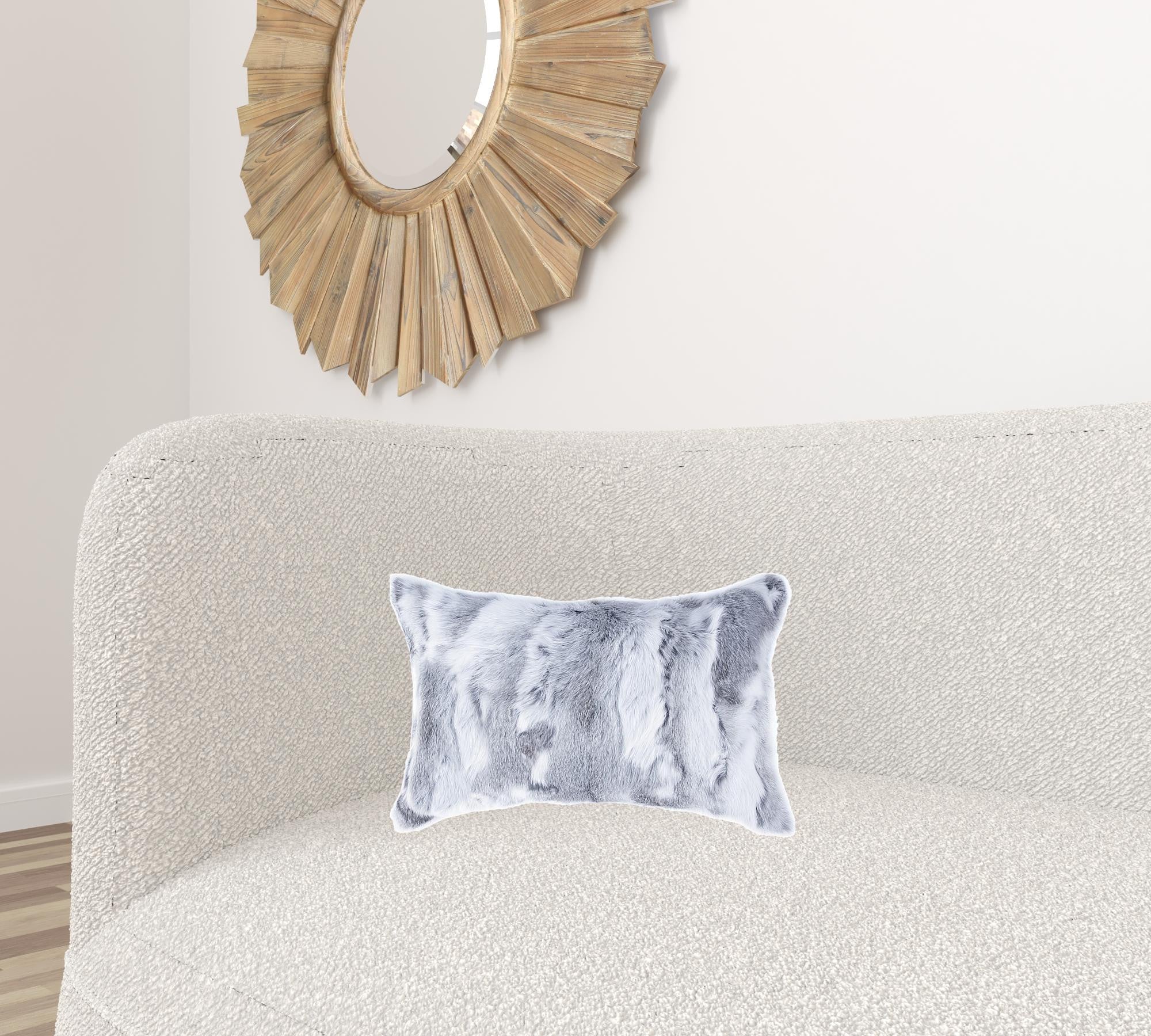 Luxurious 5x12x20 inches grey pillow made from 100% natural rabbit fur, featuring a soft micro suede backing and hidden zipper closure.