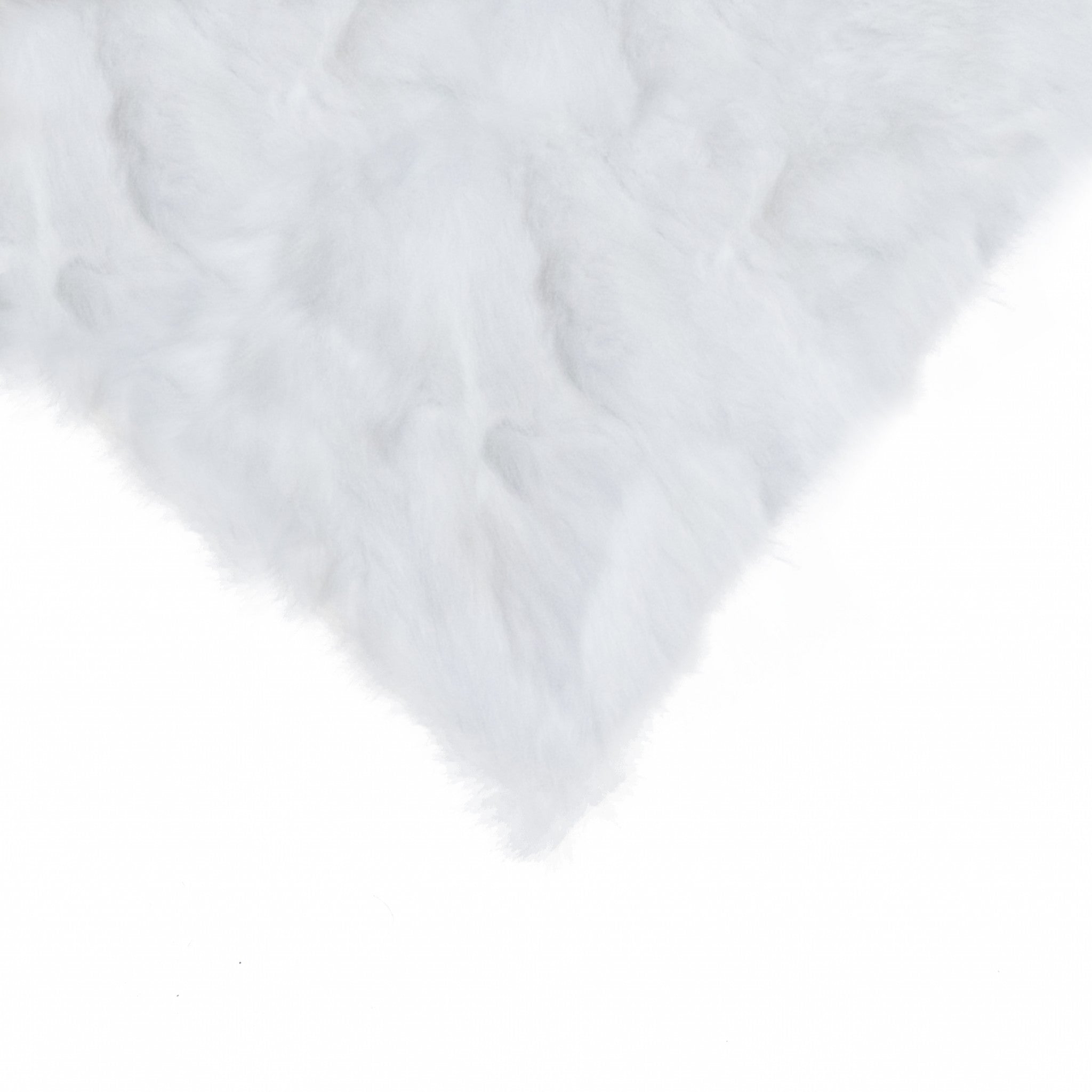 A luxurious 5x12x20 inches white pillow made from 100% natural rabbit fur, showcasing its soft texture and elegant design.
