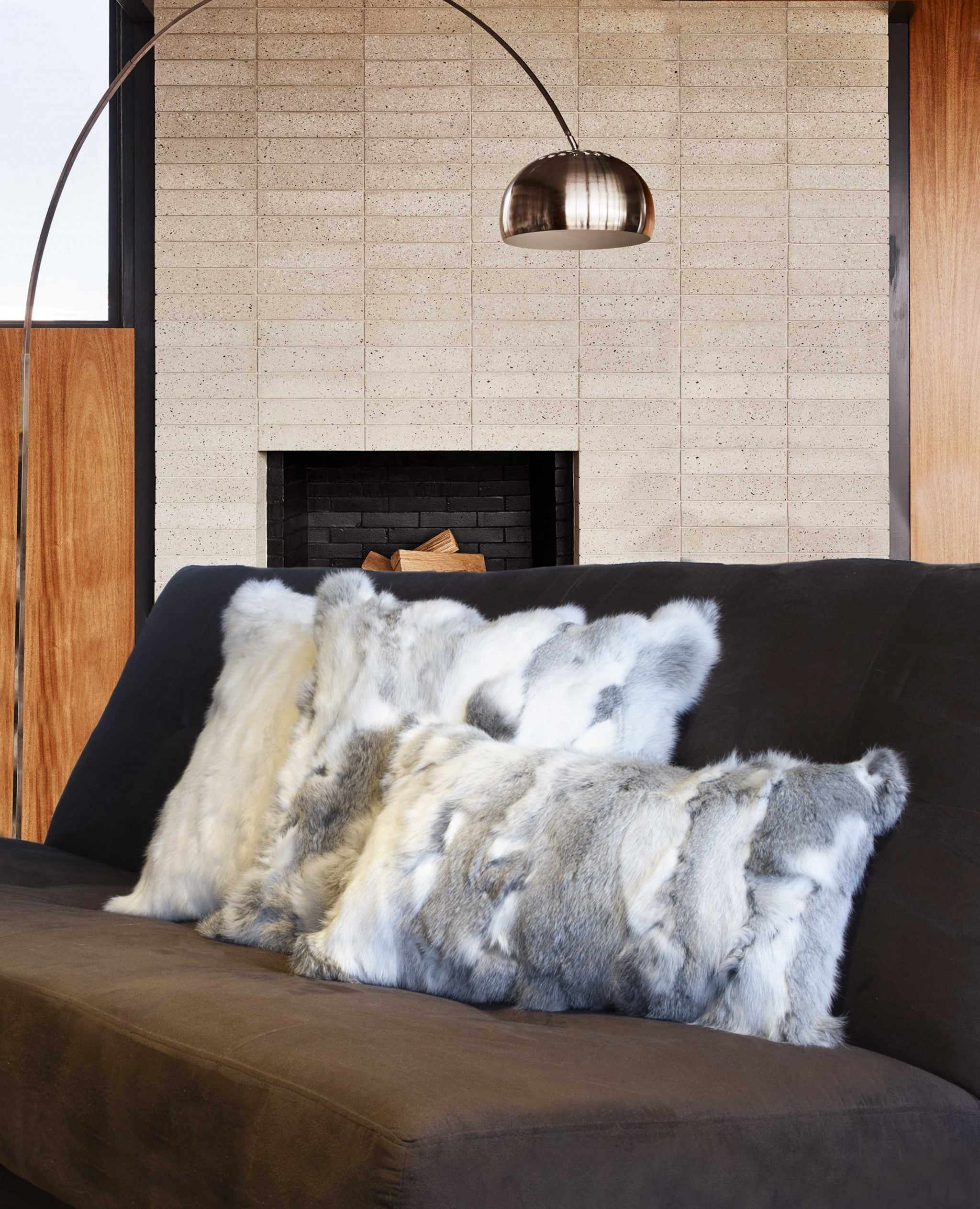 Luxurious 5x18x18 inches grey pillow made from 100% natural rabbit fur, featuring a soft micro suede backing and hand-tufted design.