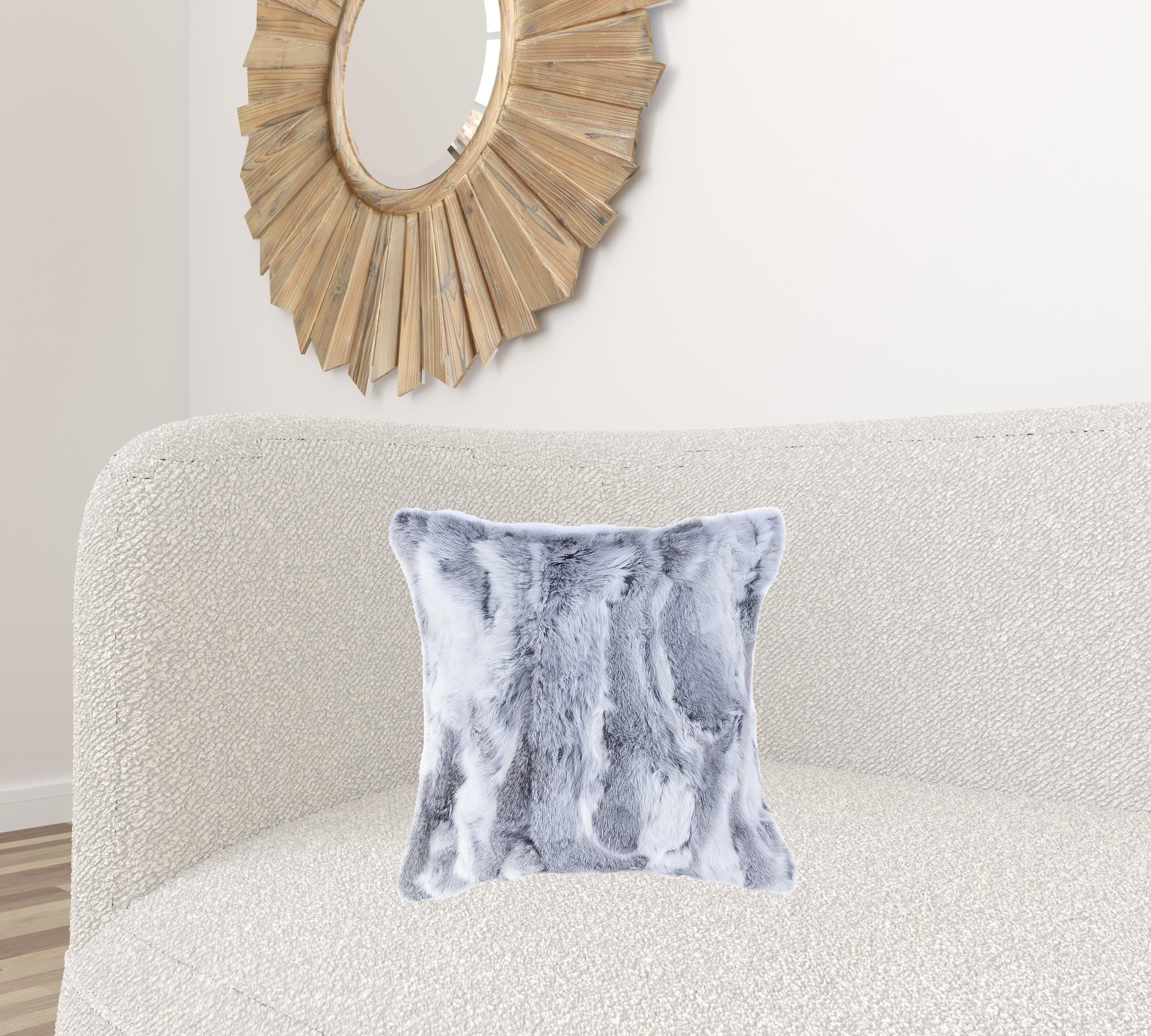 Luxurious 5x18x18 inches grey pillow made from 100% natural rabbit fur, featuring a soft micro suede backing and hand-tufted design.