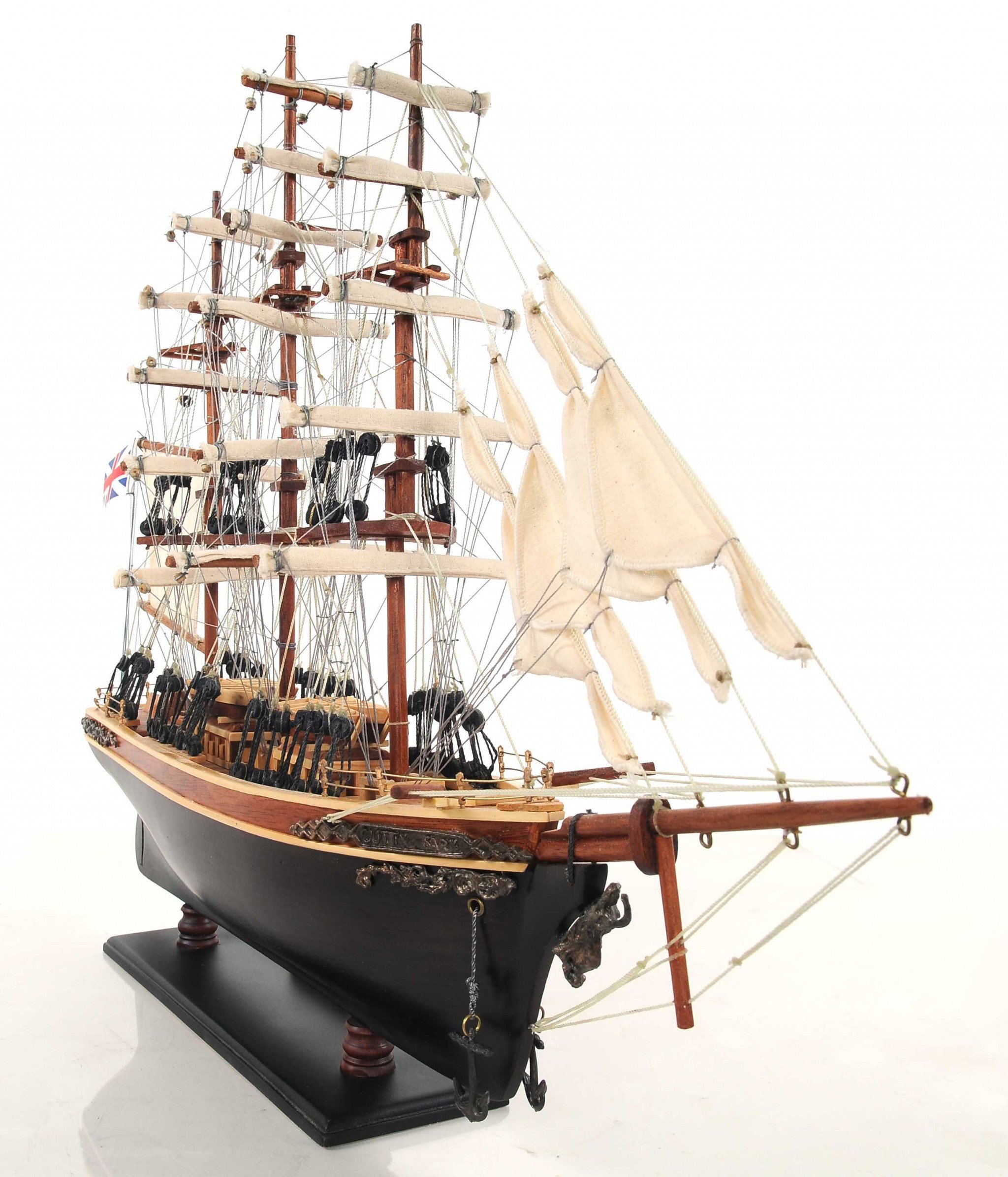 Handcrafted Small Cutty Sark model made of exotic wood with detailed features including masts, sails, and metal ornaments.