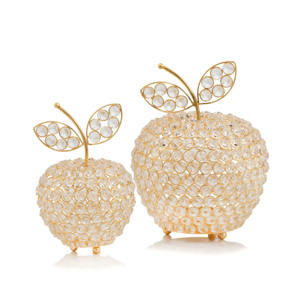 A stunning silver crystal apple measuring 5.5x5.5x8 inches, reflecting light beautifully and showcasing modern elegance.