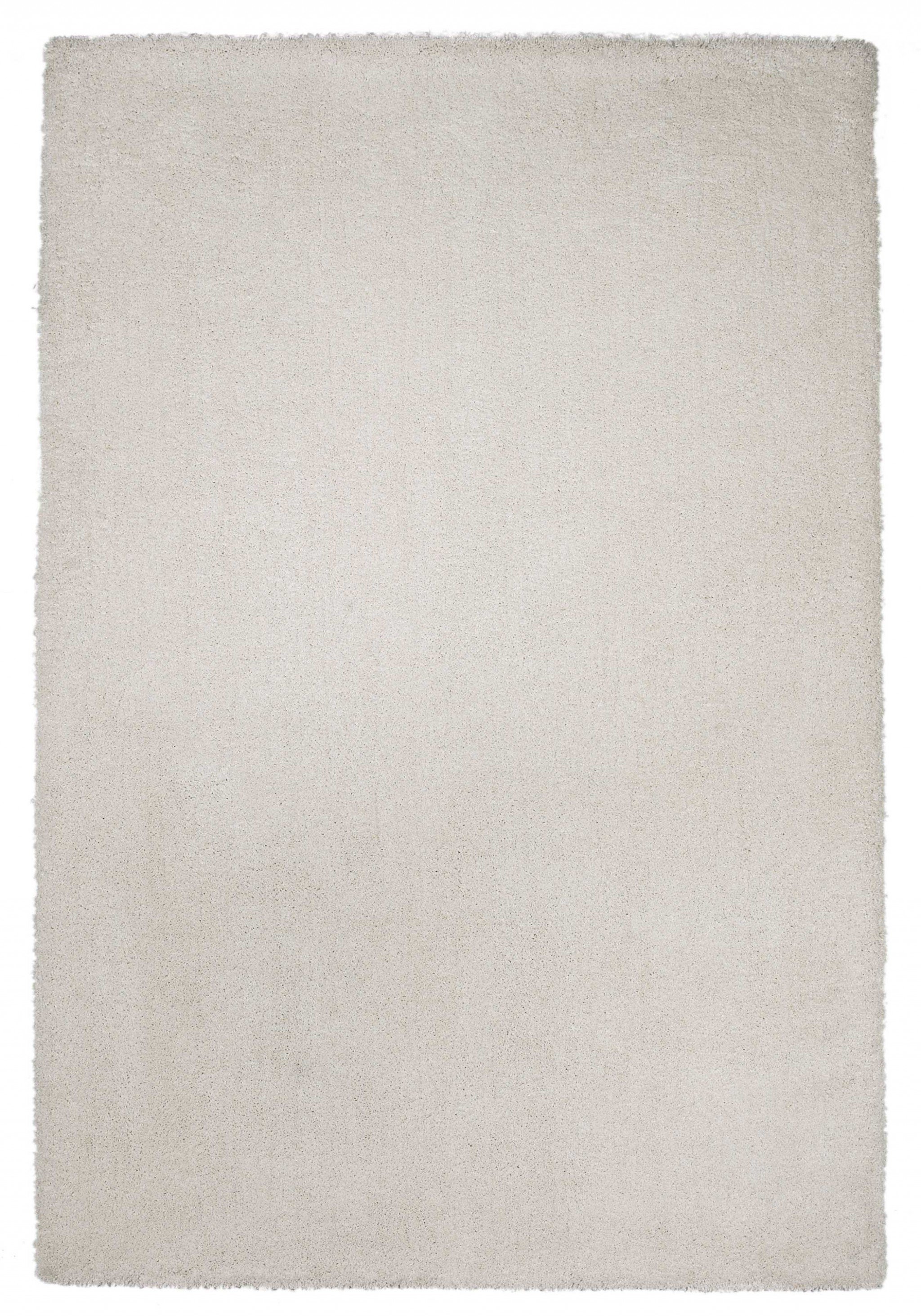 5 inches x 7 inches ivory plain indoor area rug with a soft shag texture, perfect for modern home decor.