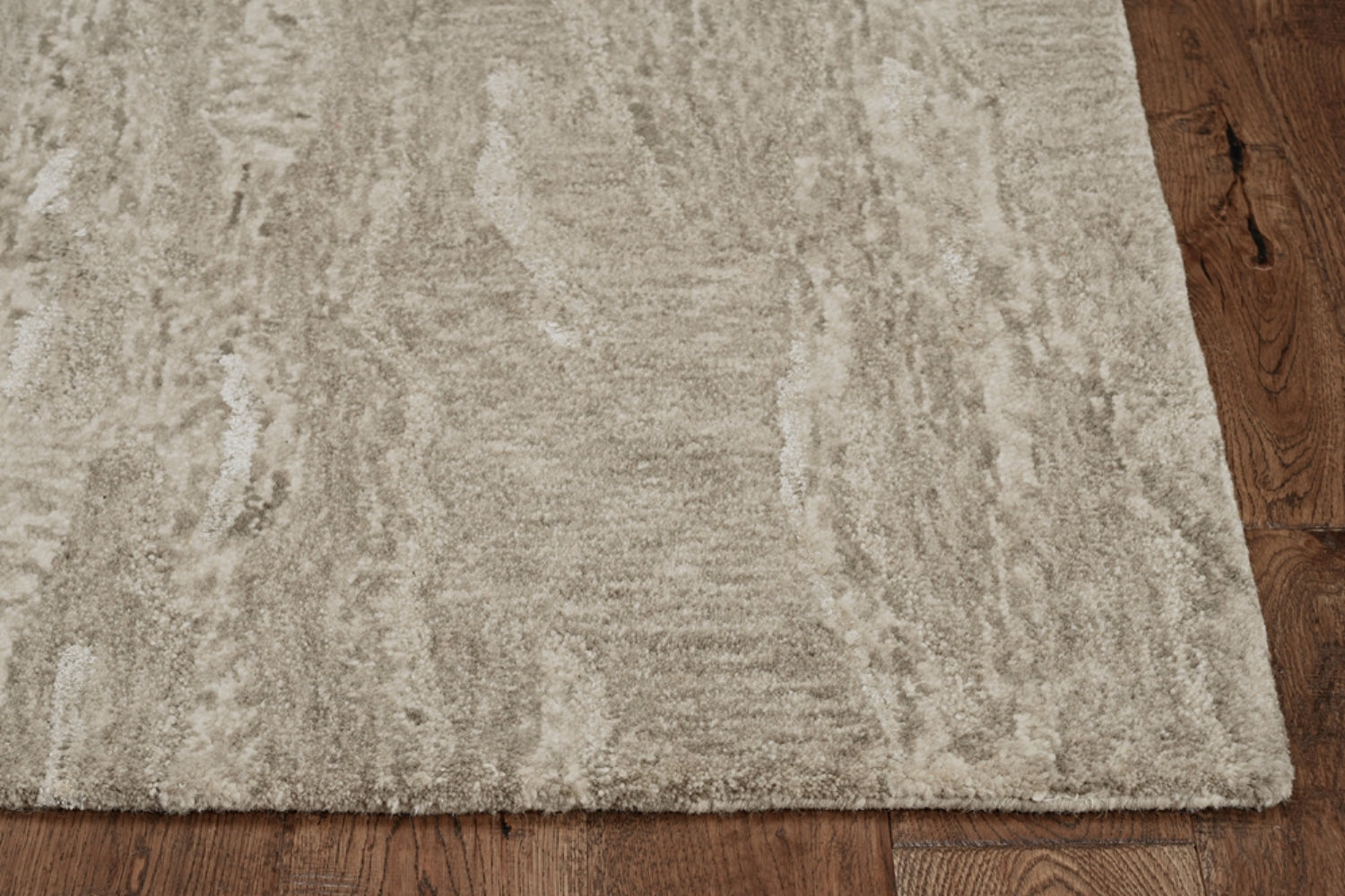 5x7 inches sand plain wool indoor area rug with viscose highlights, showcasing a soft texture and serene color.