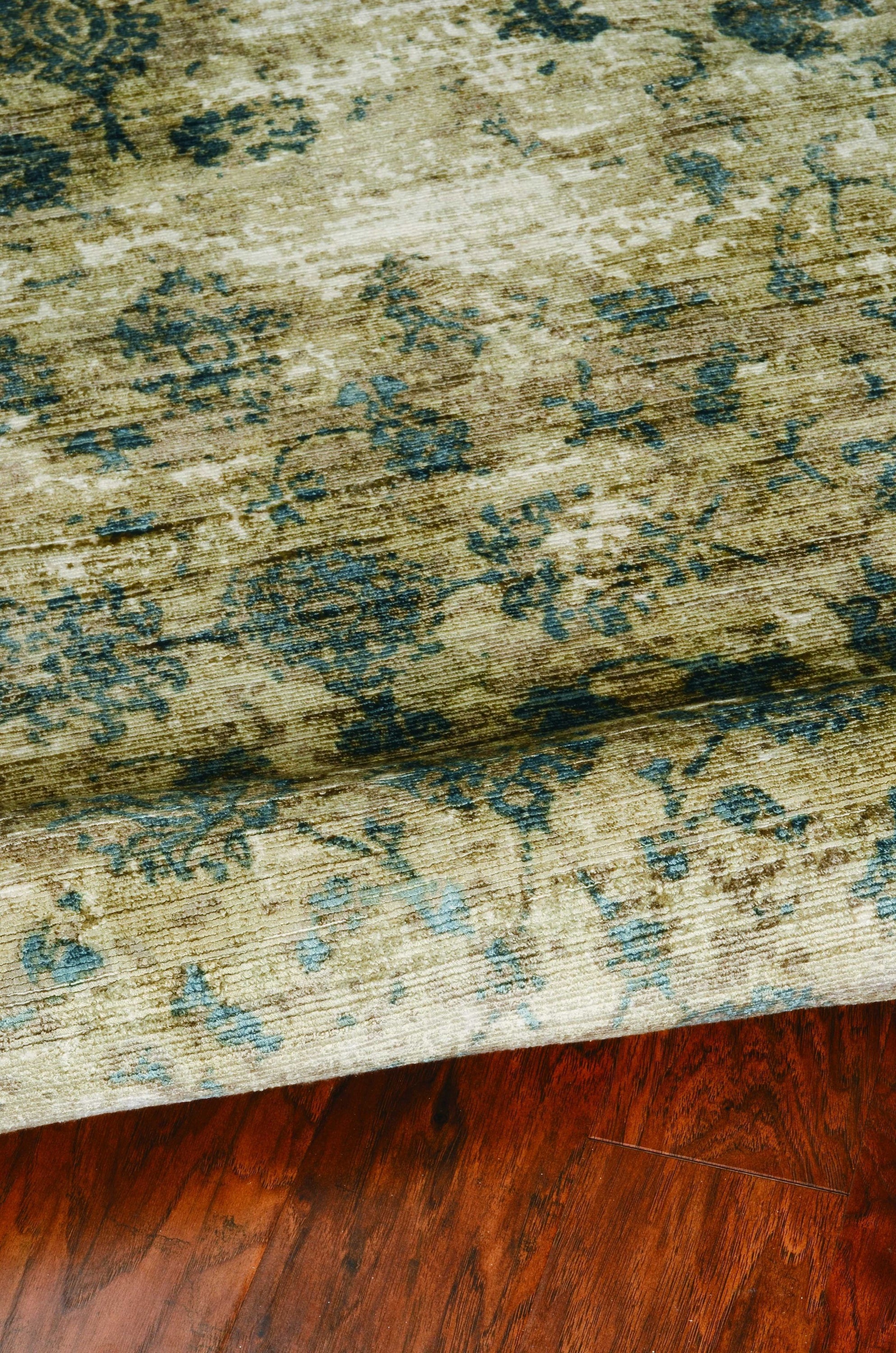 5x7 viscose area rug in sand and blue colors, showcasing a modern watercolor pattern, perfect for enhancing home decor.