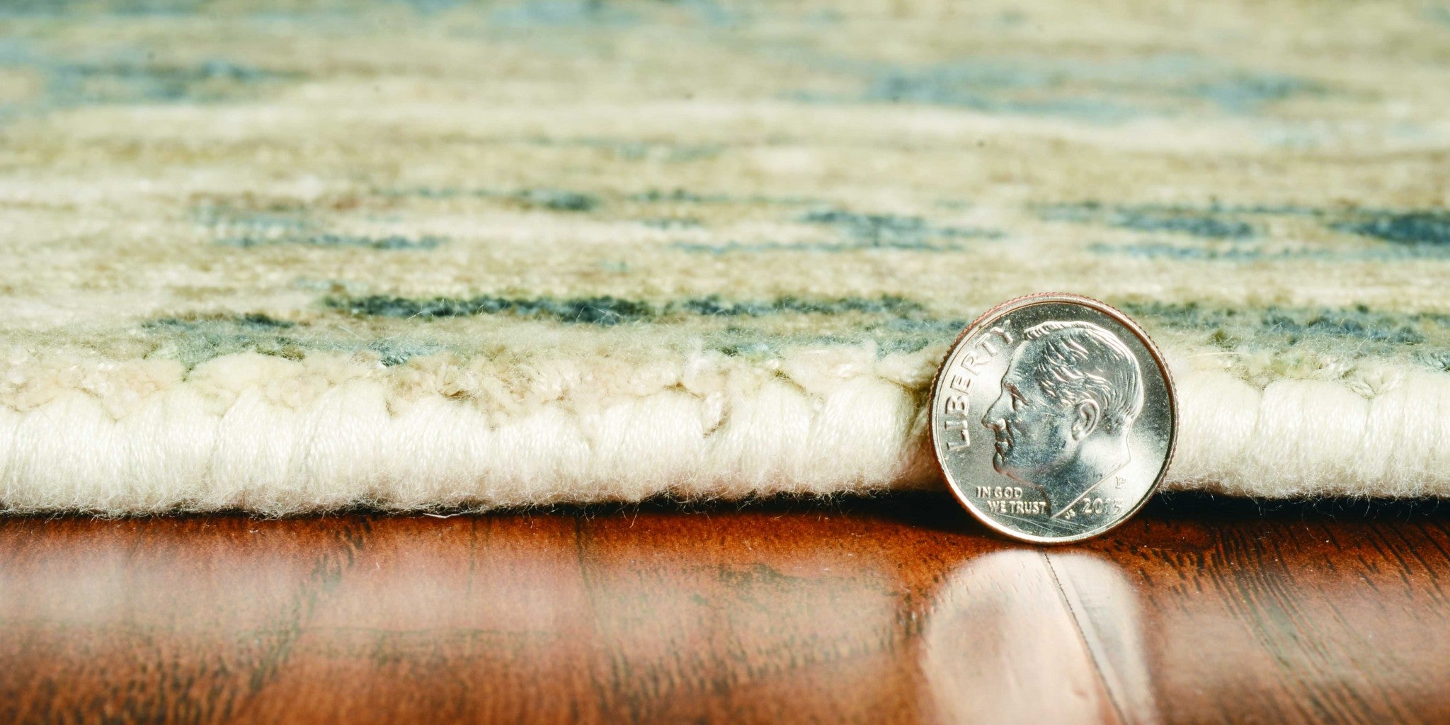 5x7 viscose area rug in sand and blue colors, showcasing a modern watercolor pattern, perfect for enhancing home decor.