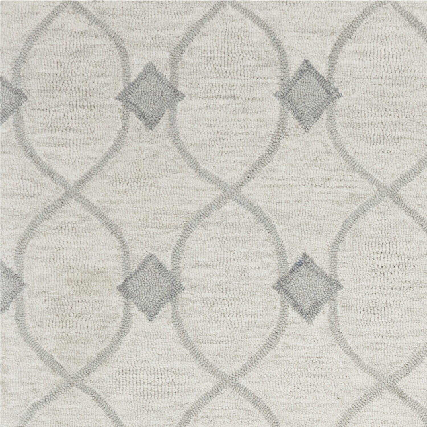 5x7 ivory hand-tufted wool ogee indoor area rug showcasing a geometric pattern, perfect for enhancing living spaces.