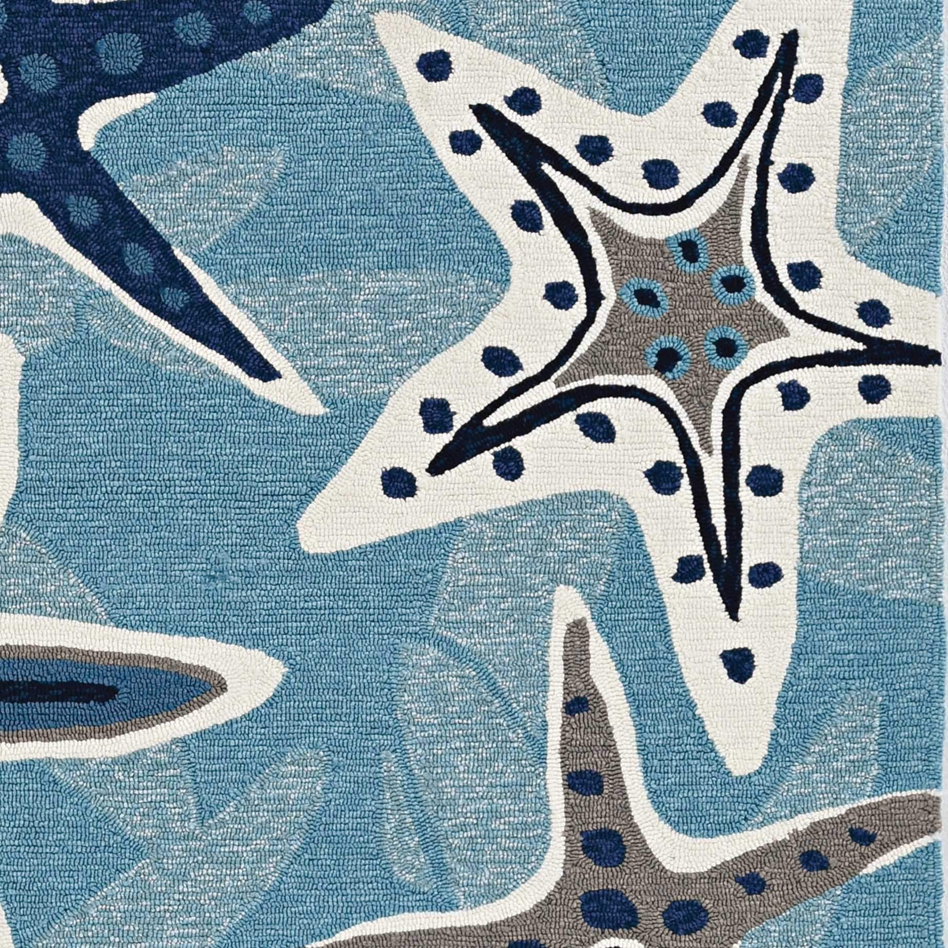 5x8 Blue Hand Woven UV Treated Coastal Starfish rug, showcasing intricate starfish design and vibrant blue color, perfect for indoor and outdoor use.