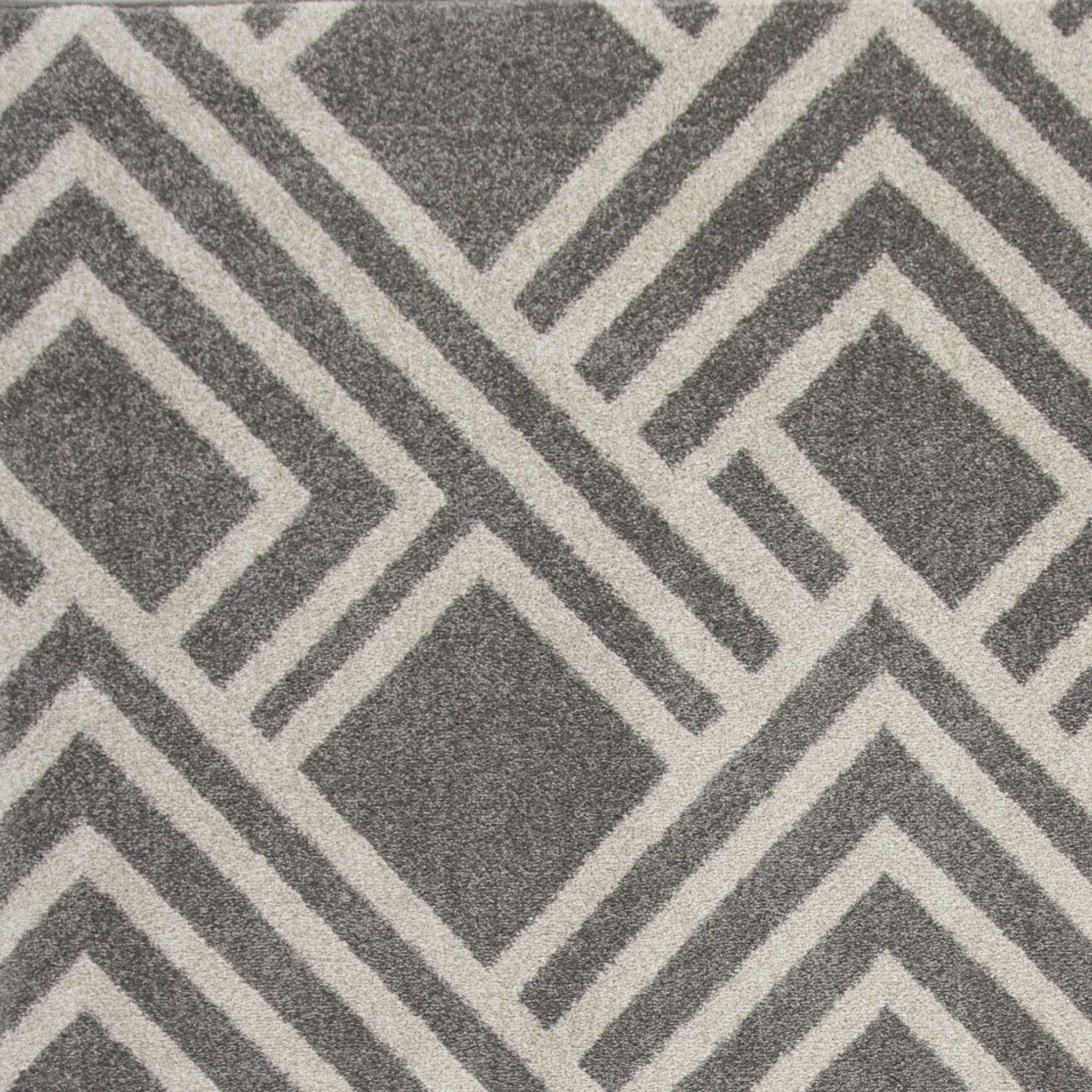 5x8 grey geometric indoor outdoor rug, machine woven, UV treated, showcasing elegant patterns and durable material.