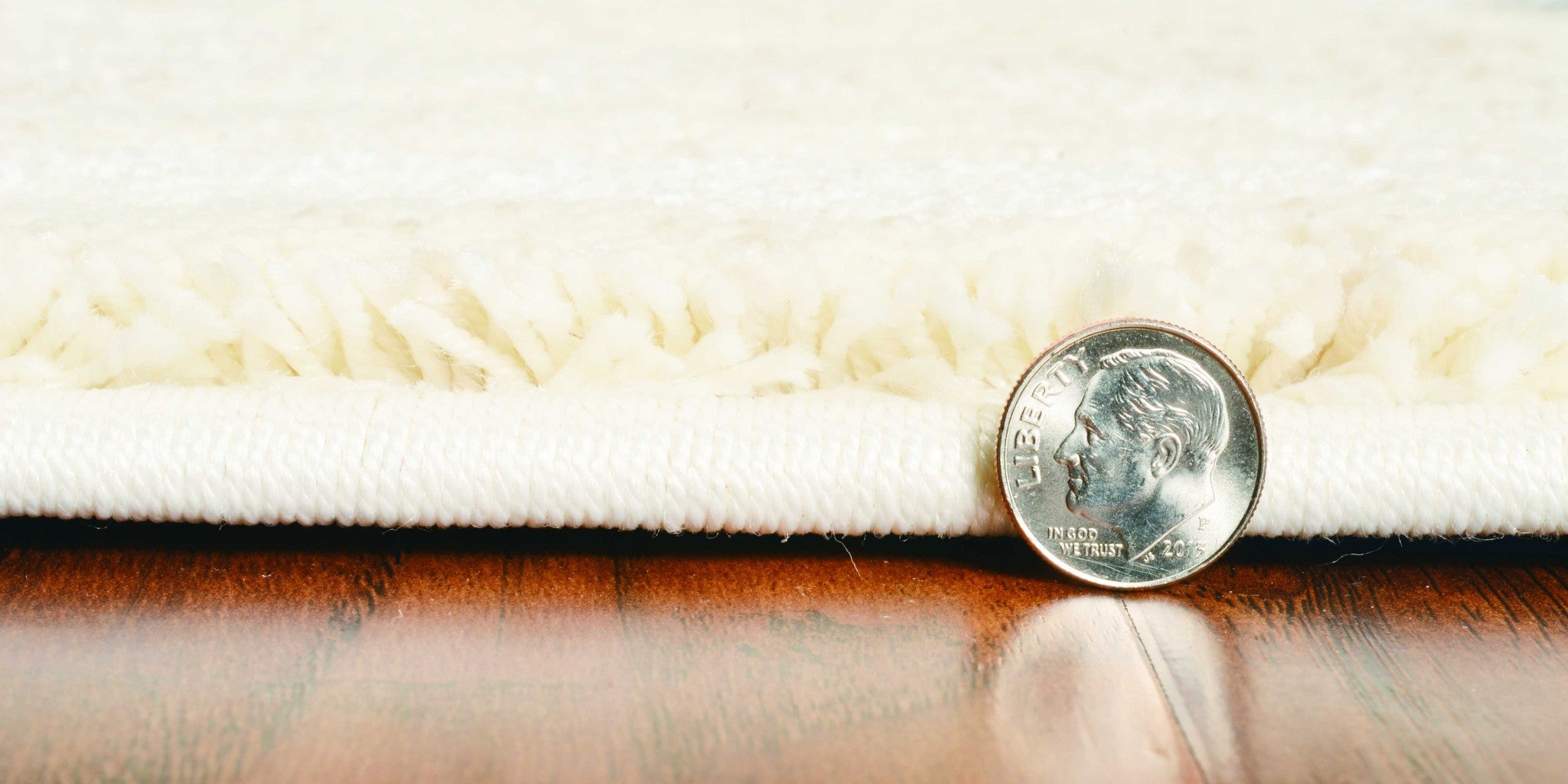 5x8 ivory grey machine woven abstract brushstrokes indoor rug, showcasing a contemporary design with elegant brushstroke patterns.