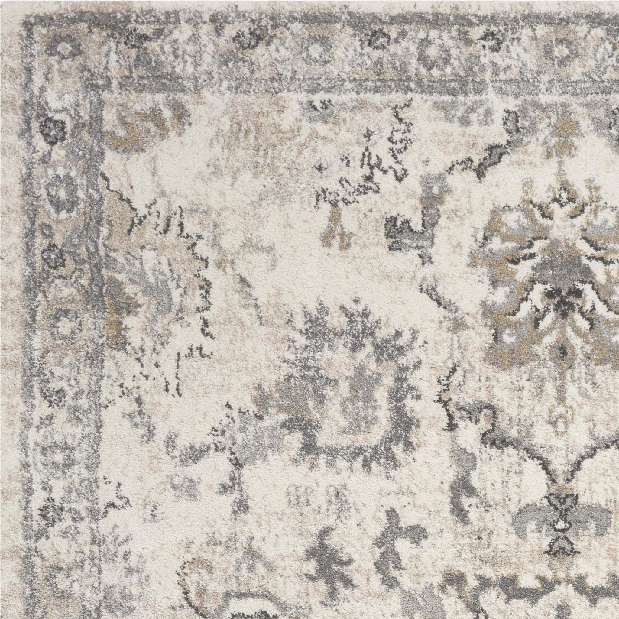 5x8 inches ivory machine woven distressed floral rug showcasing intricate floral patterns and a contemporary design.