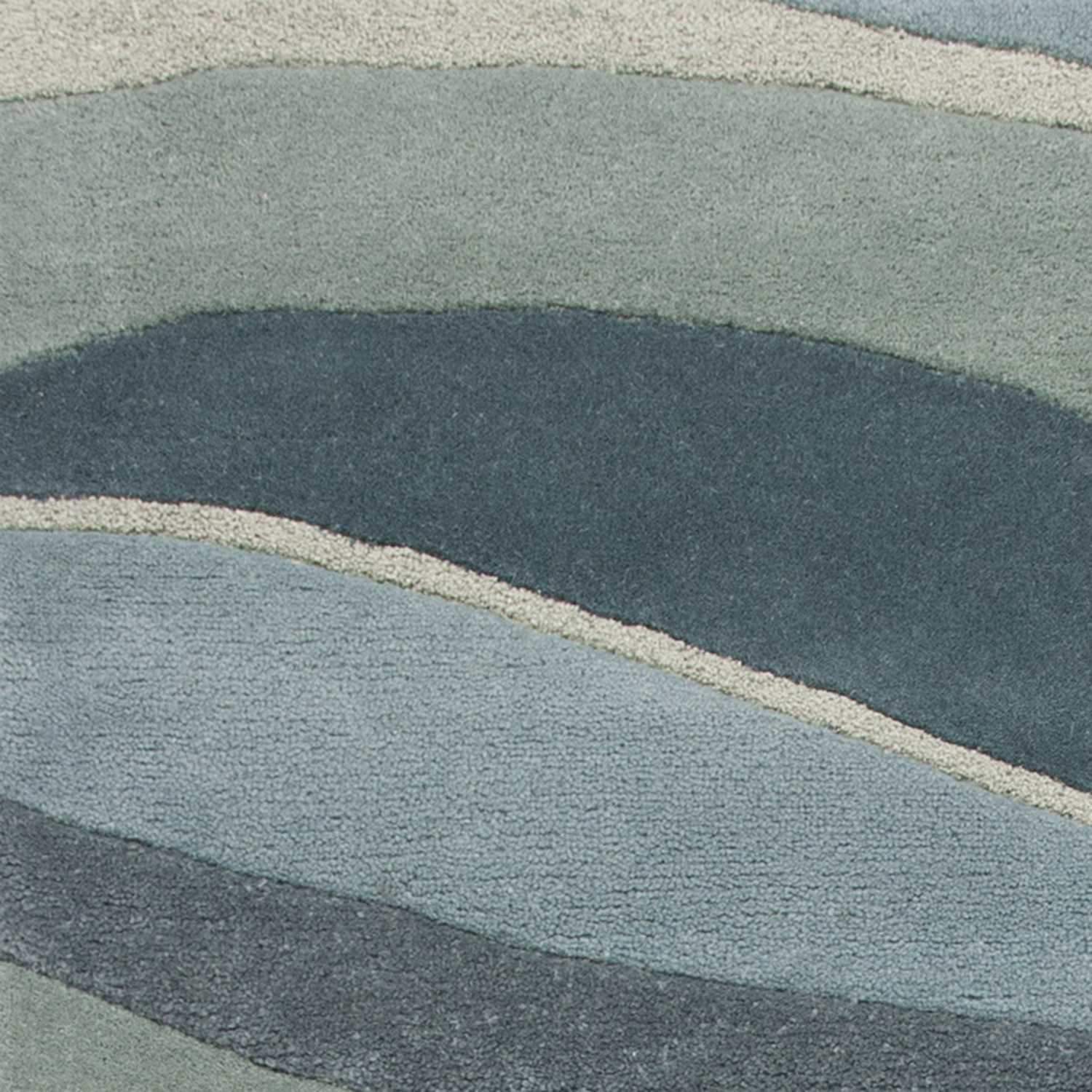 Ocean Blue Teal Hand Tufted Abstract Waves Indoor Area Rug, showcasing beautiful wave patterns and rich colors.