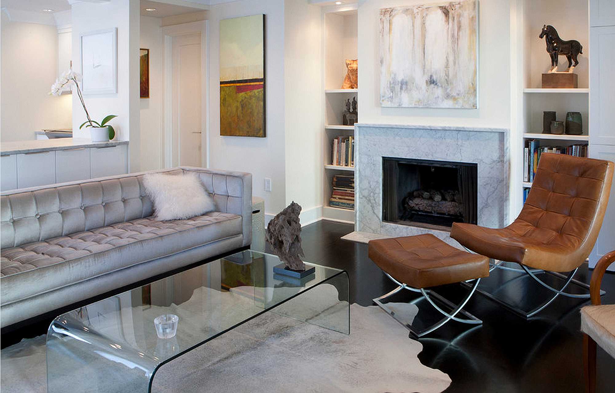 Handmade black and white cowhide area rug measuring 60x84 inches, showcasing a luxurious texture and unique patterns.